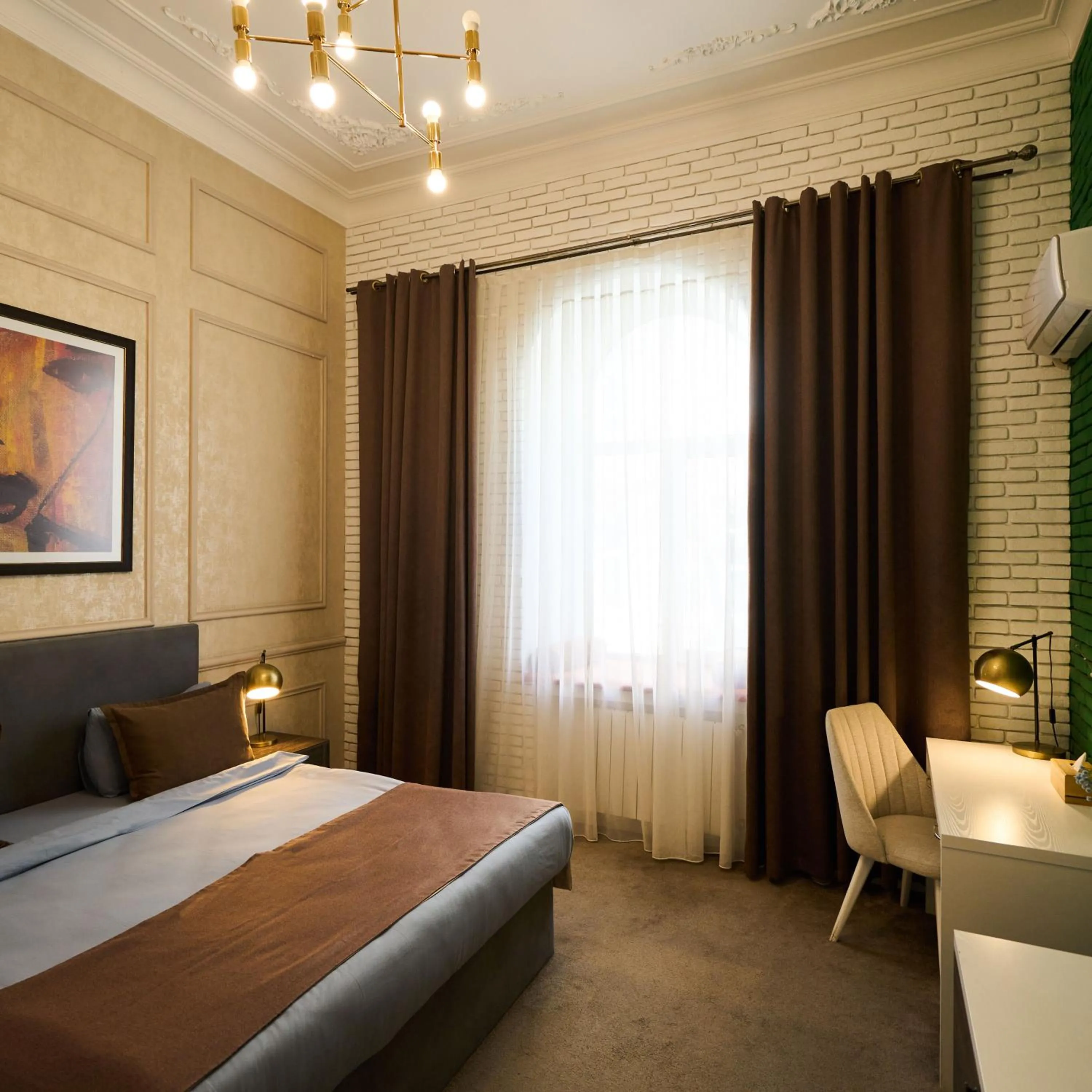 Bed in Zimmer Boutique Hotel