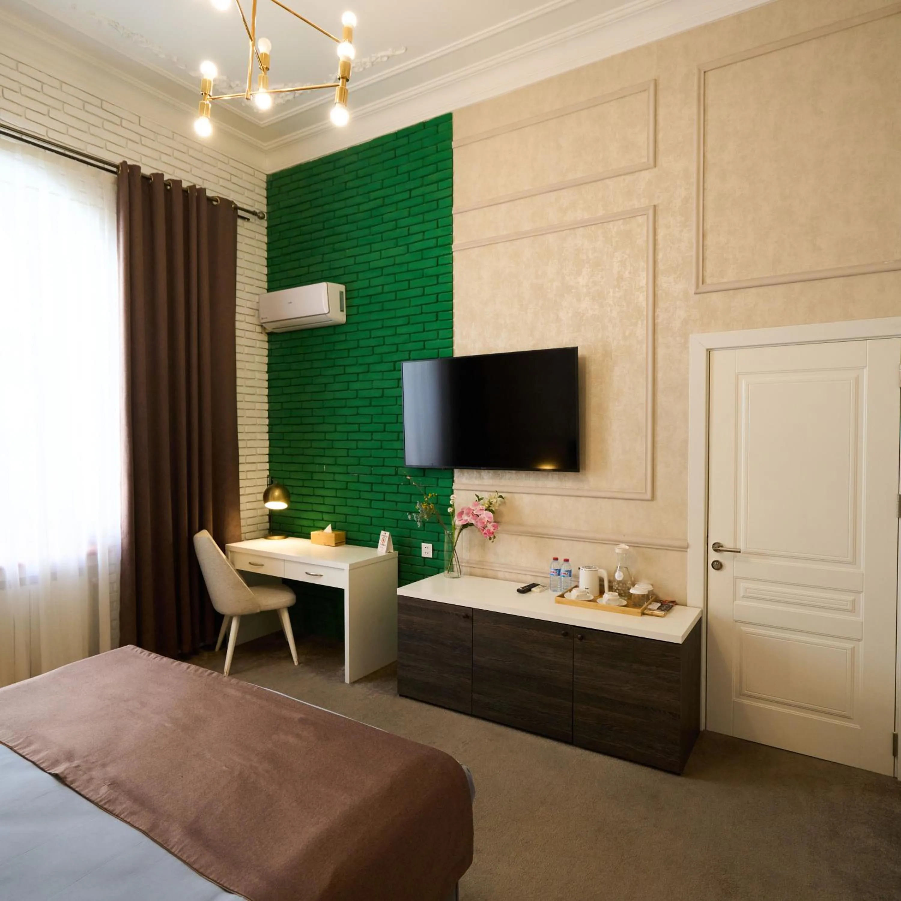 Bed in Zimmer Boutique Hotel