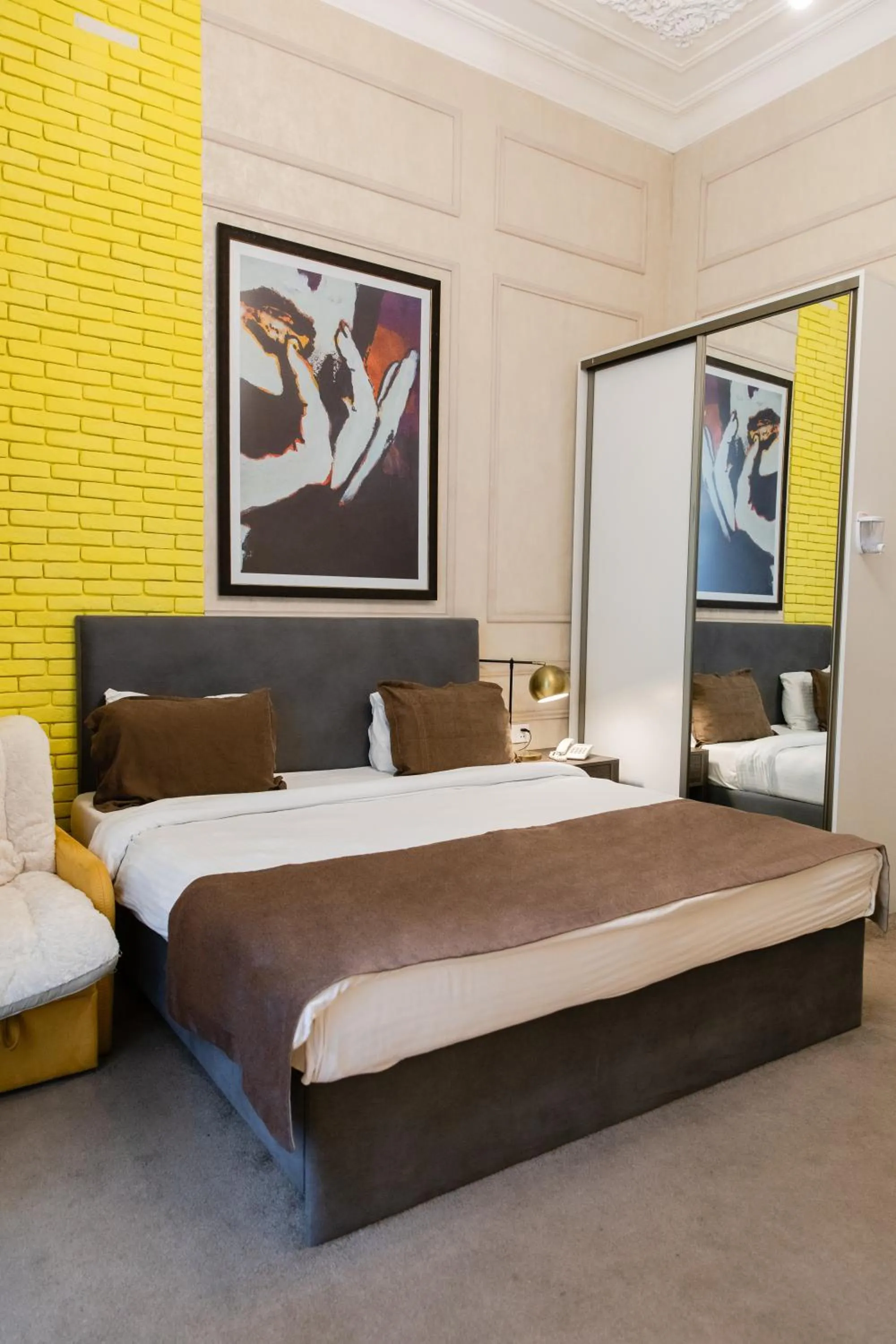 Bed in Zimmer Boutique Hotel