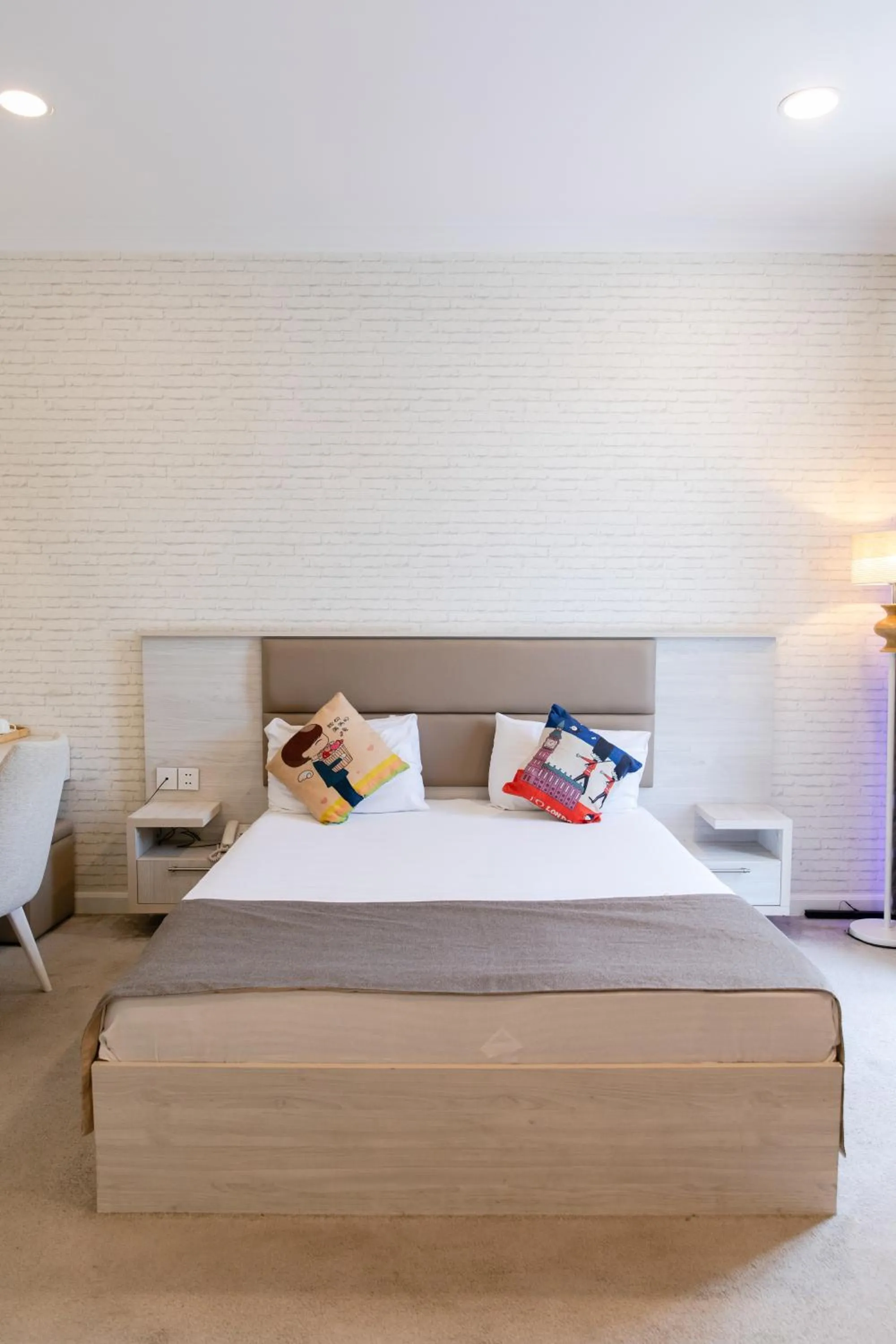 Bed in Zimmer Boutique Hotel