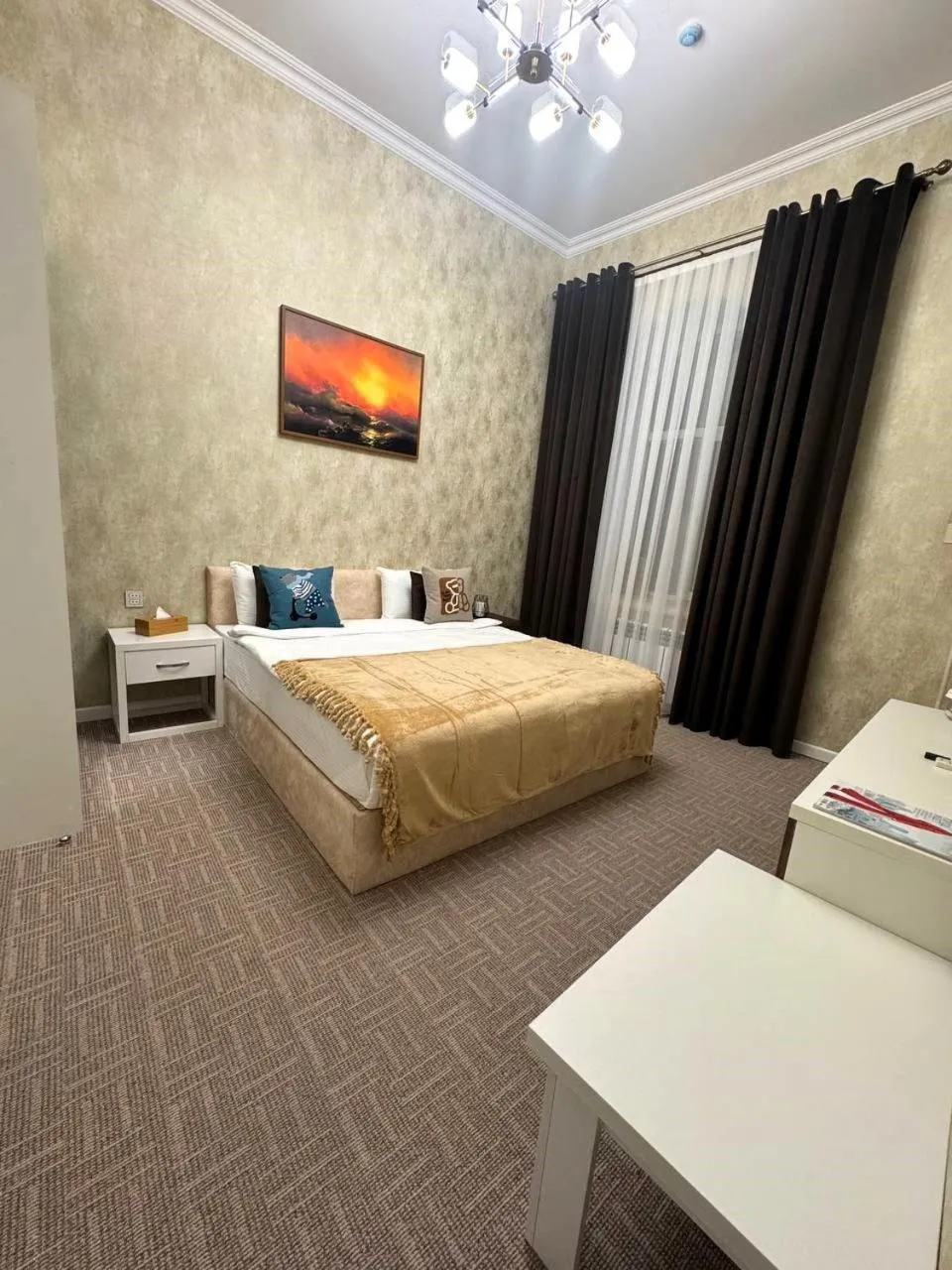 Bed in Zimmer Boutique Hotel