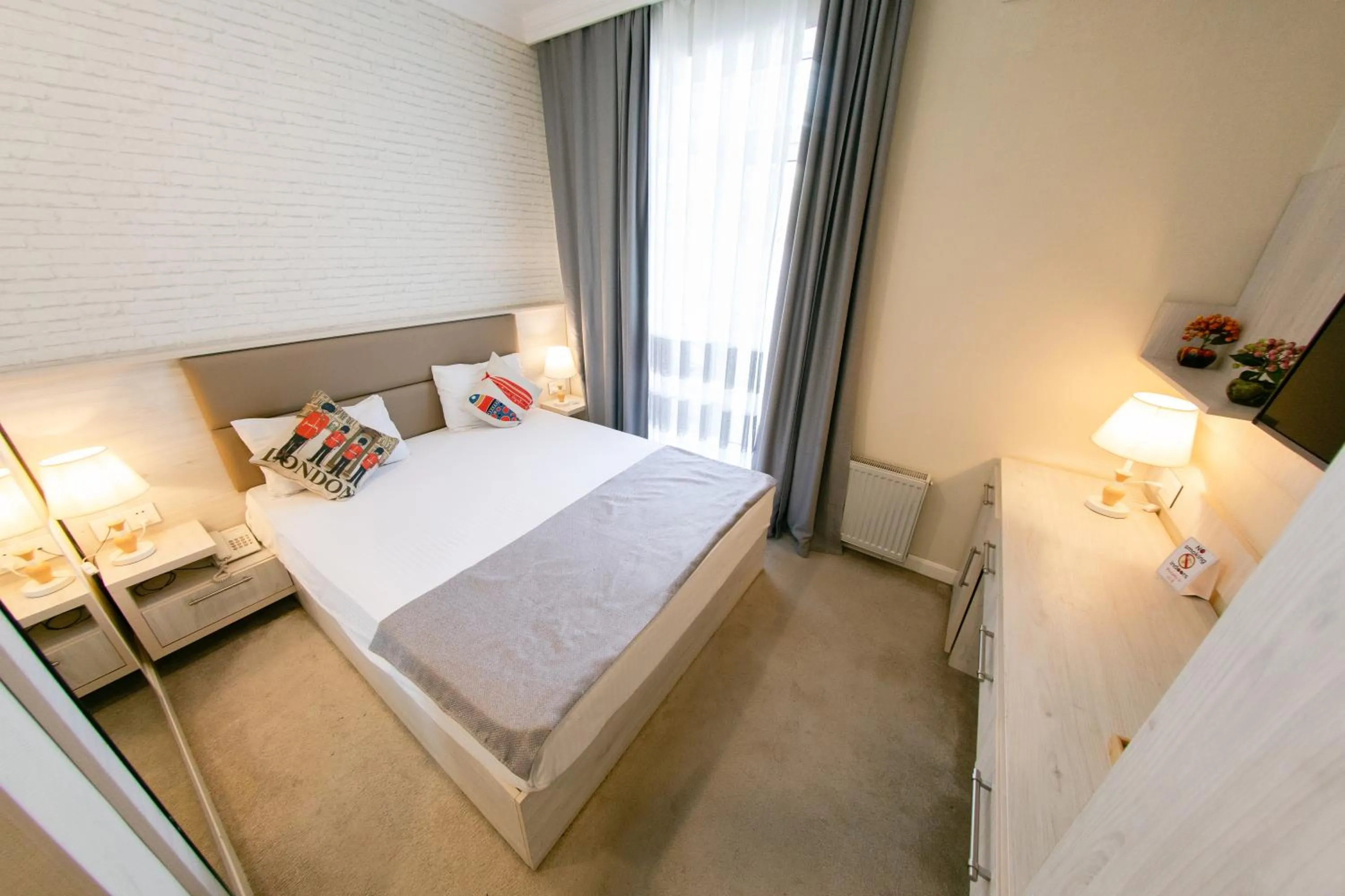 Bed in Zimmer Boutique Hotel