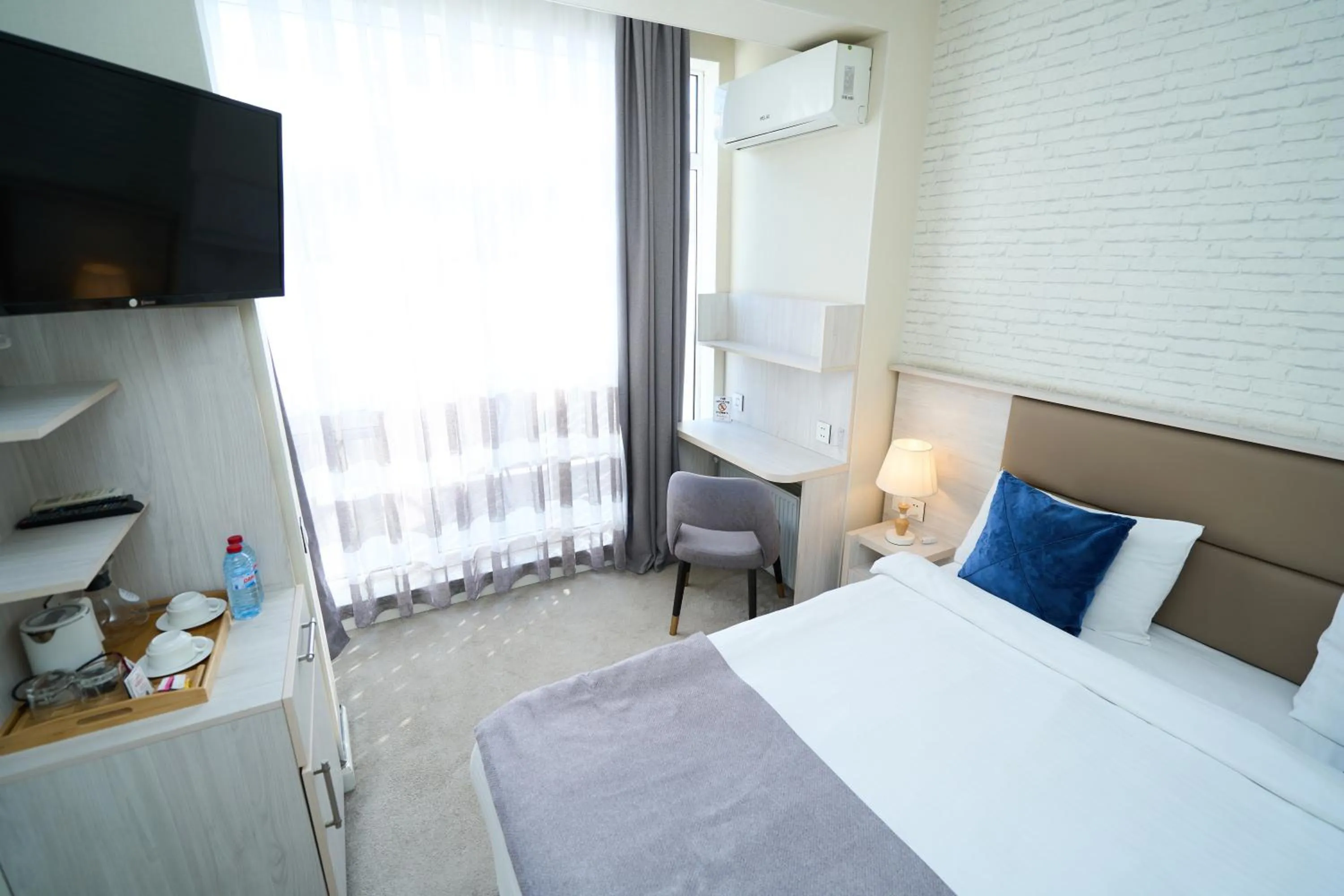 Bed in Zimmer Boutique Hotel