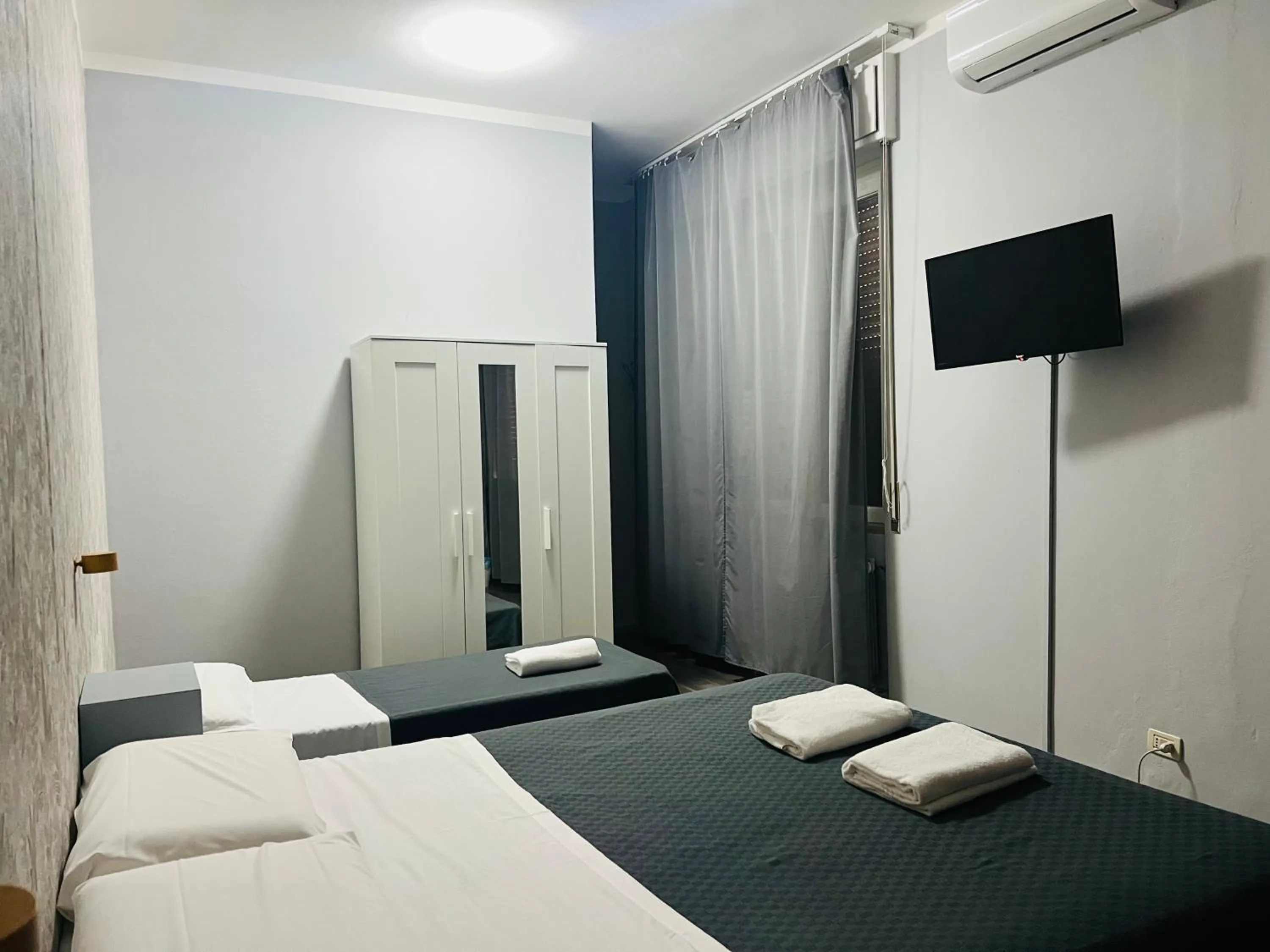 Bed in Il Galileo Rooms