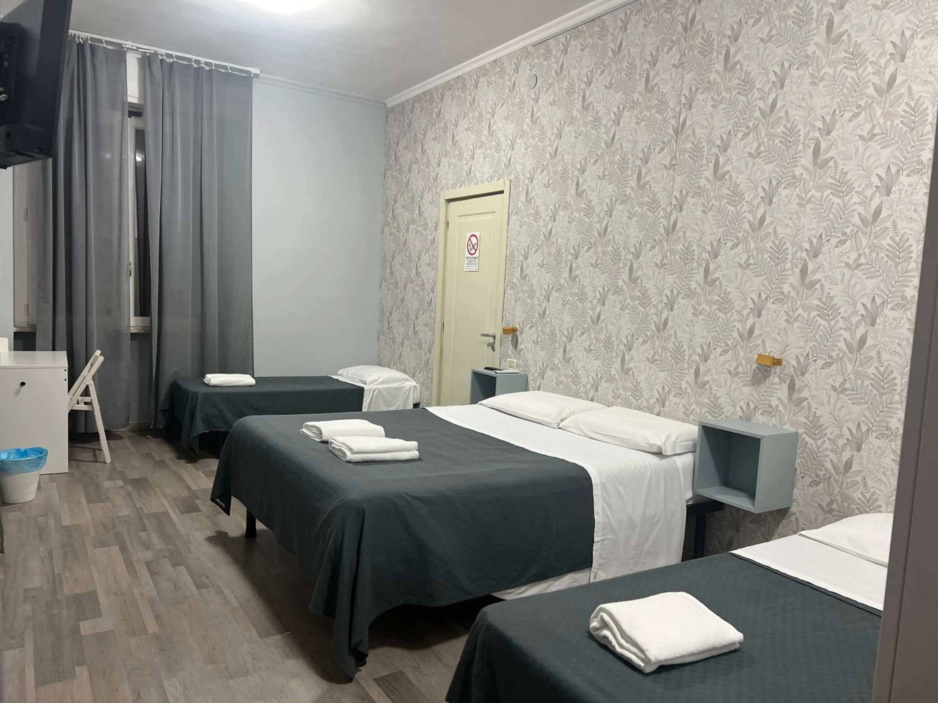 Bed in Il Galileo Rooms