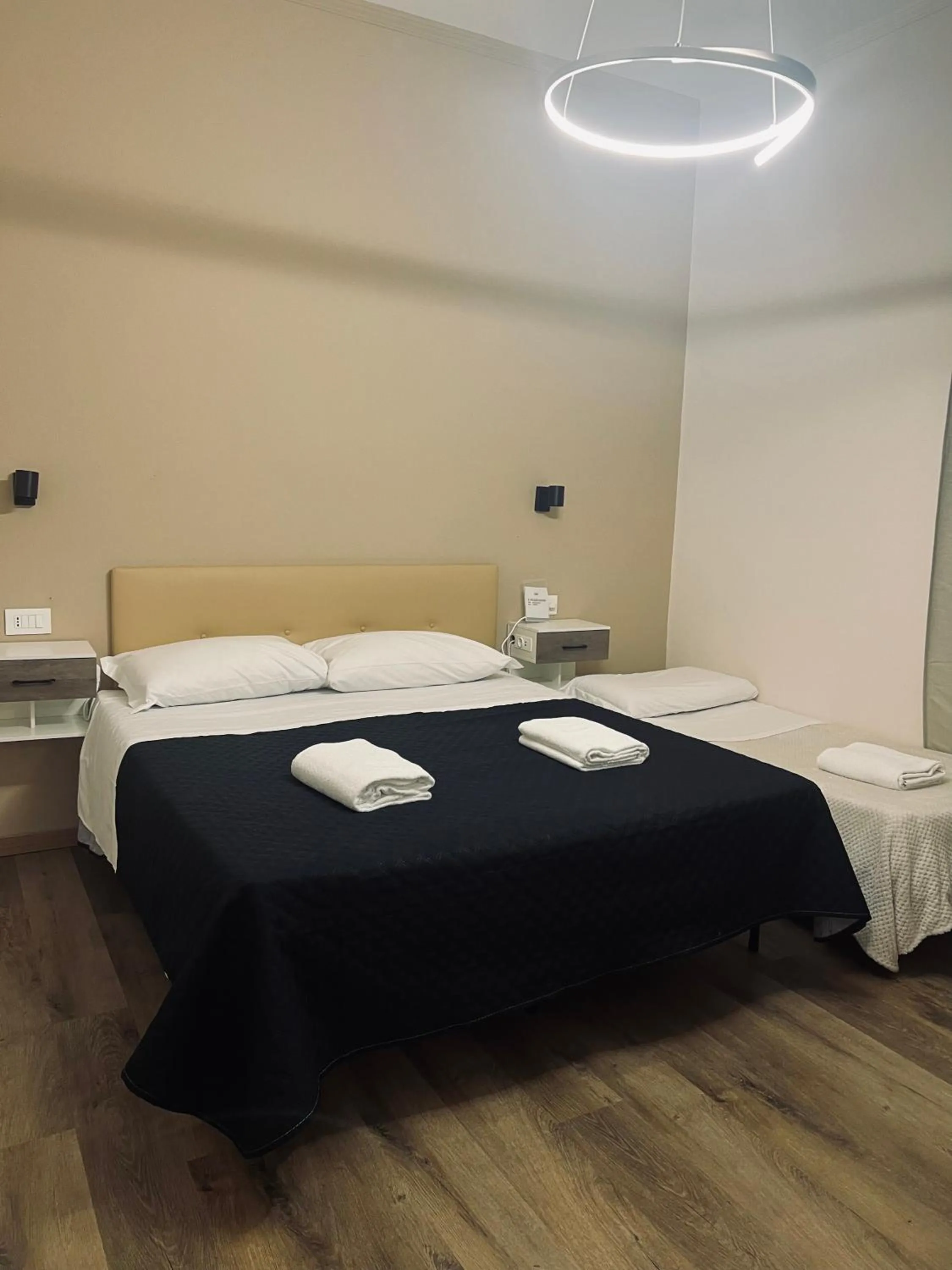 Bed in Il Galileo Rooms