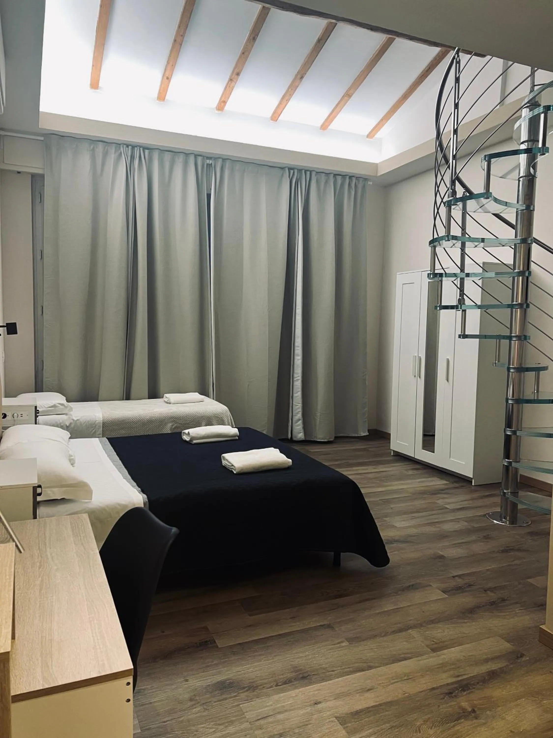 Bed in Il Galileo Rooms