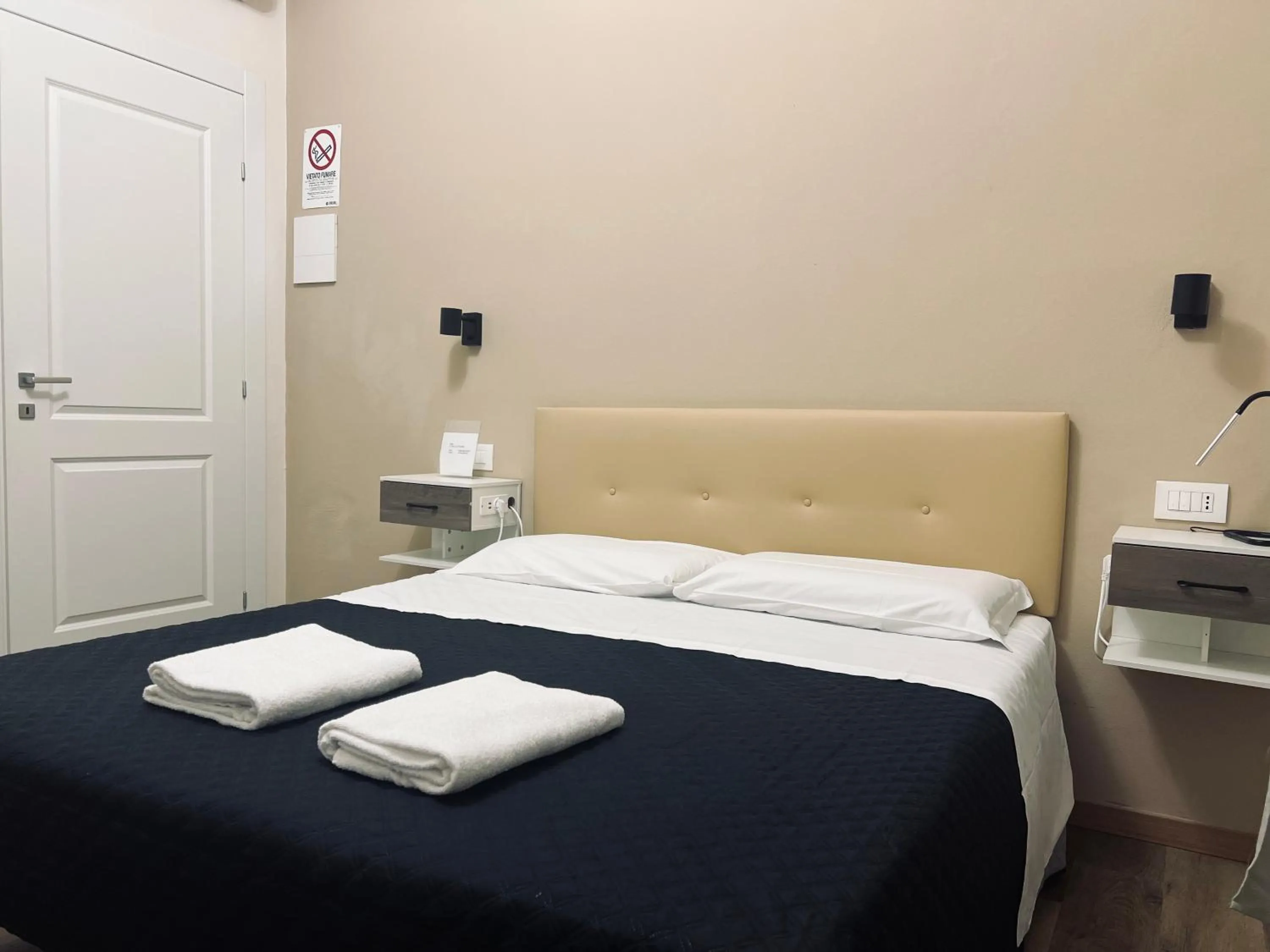 Bed in Il Galileo Rooms