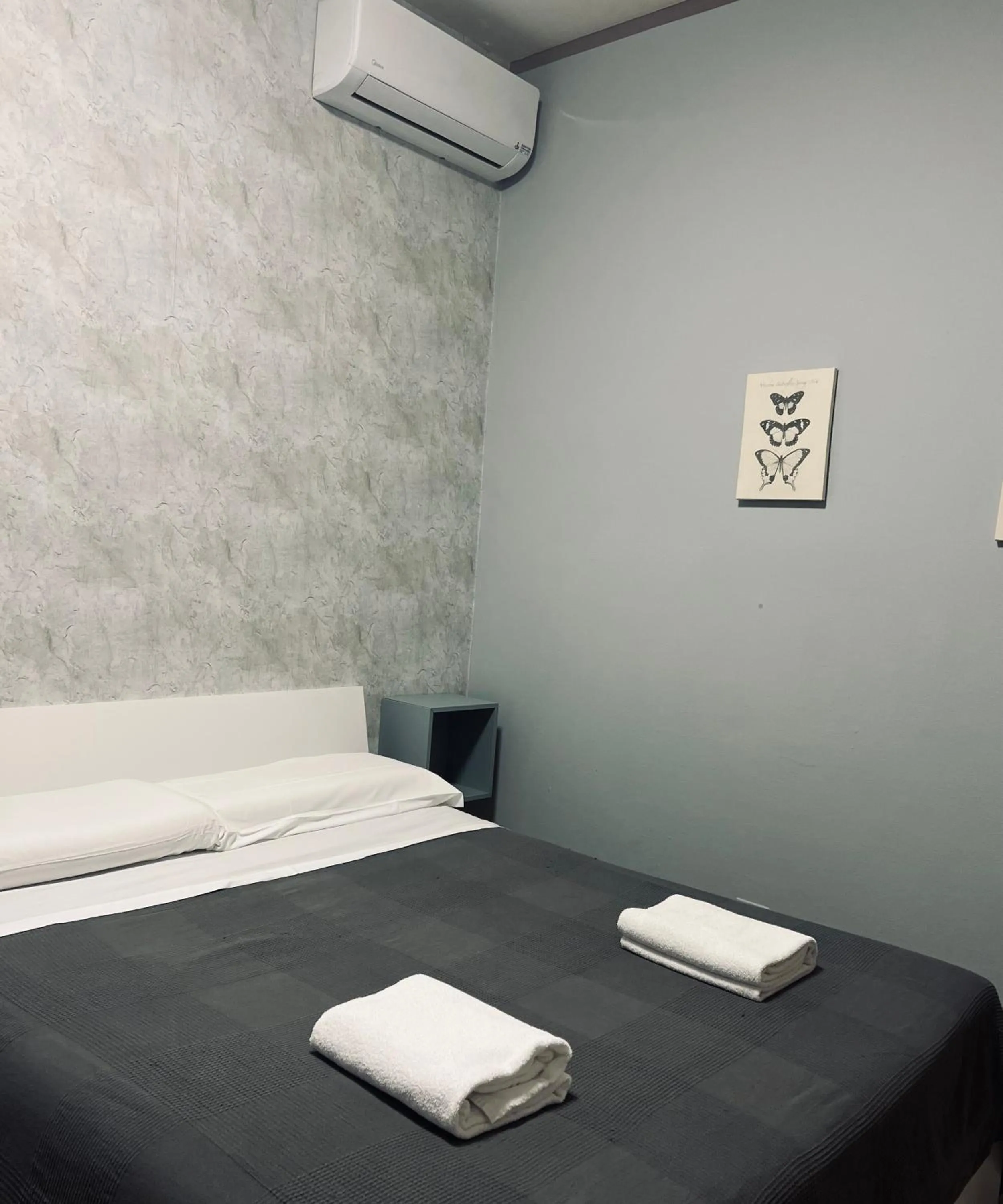 Bed in Il Galileo Rooms