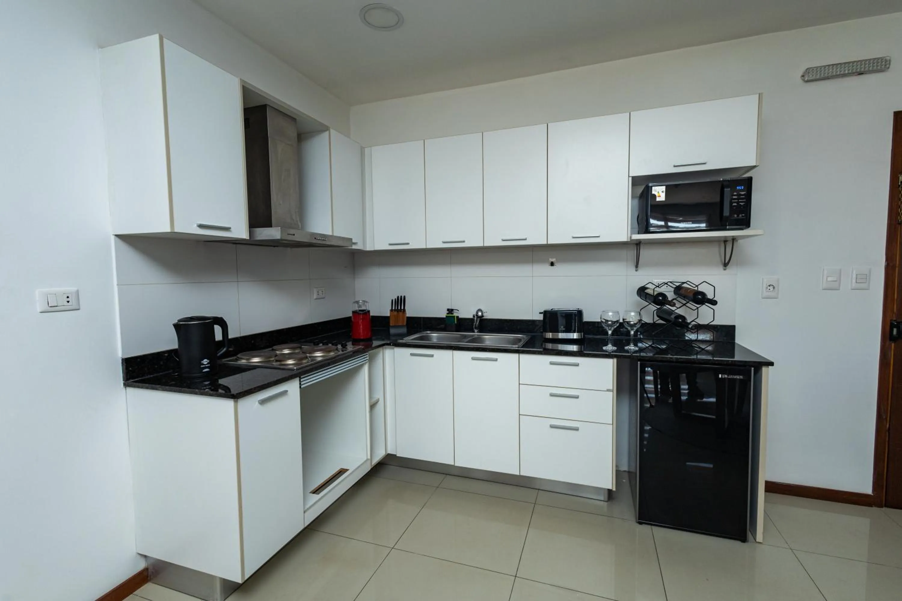 Kitchen or kitchenette in Asuncion Apart - Villa Morra