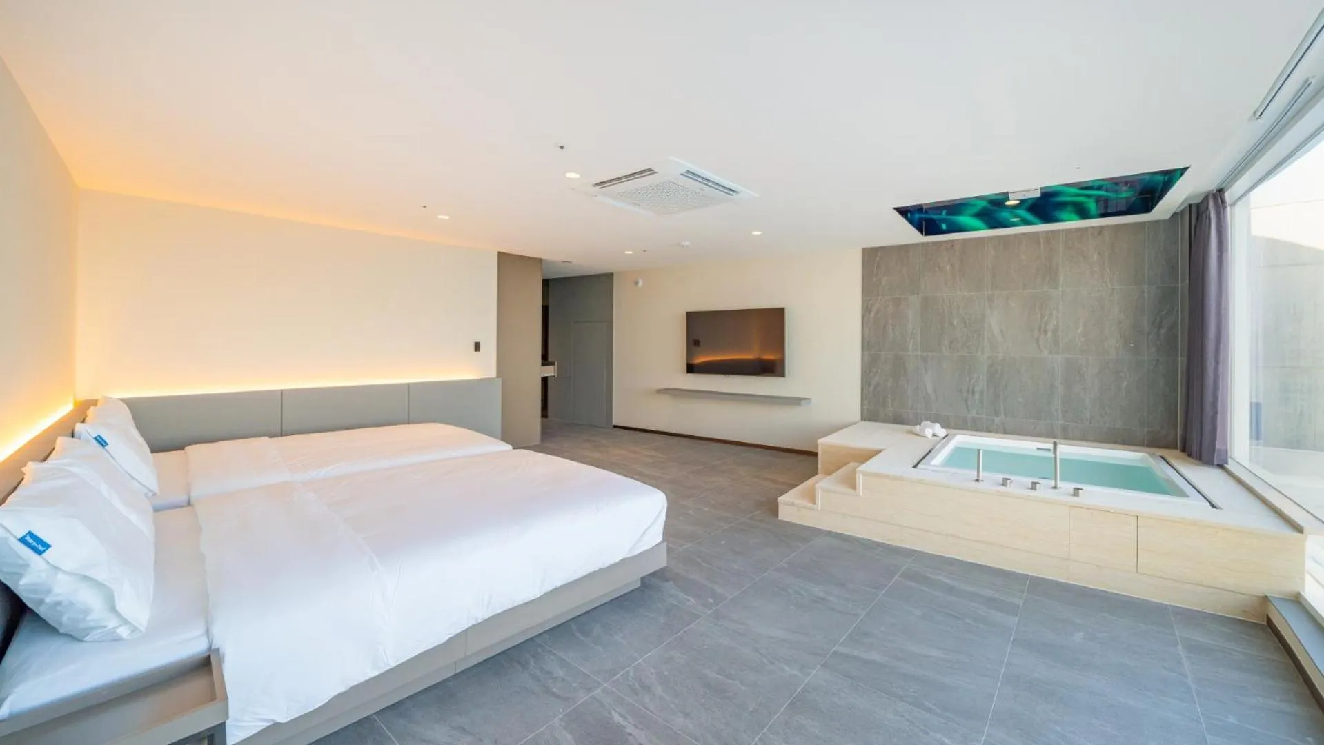 Bed in Sharp & Flat Hotel