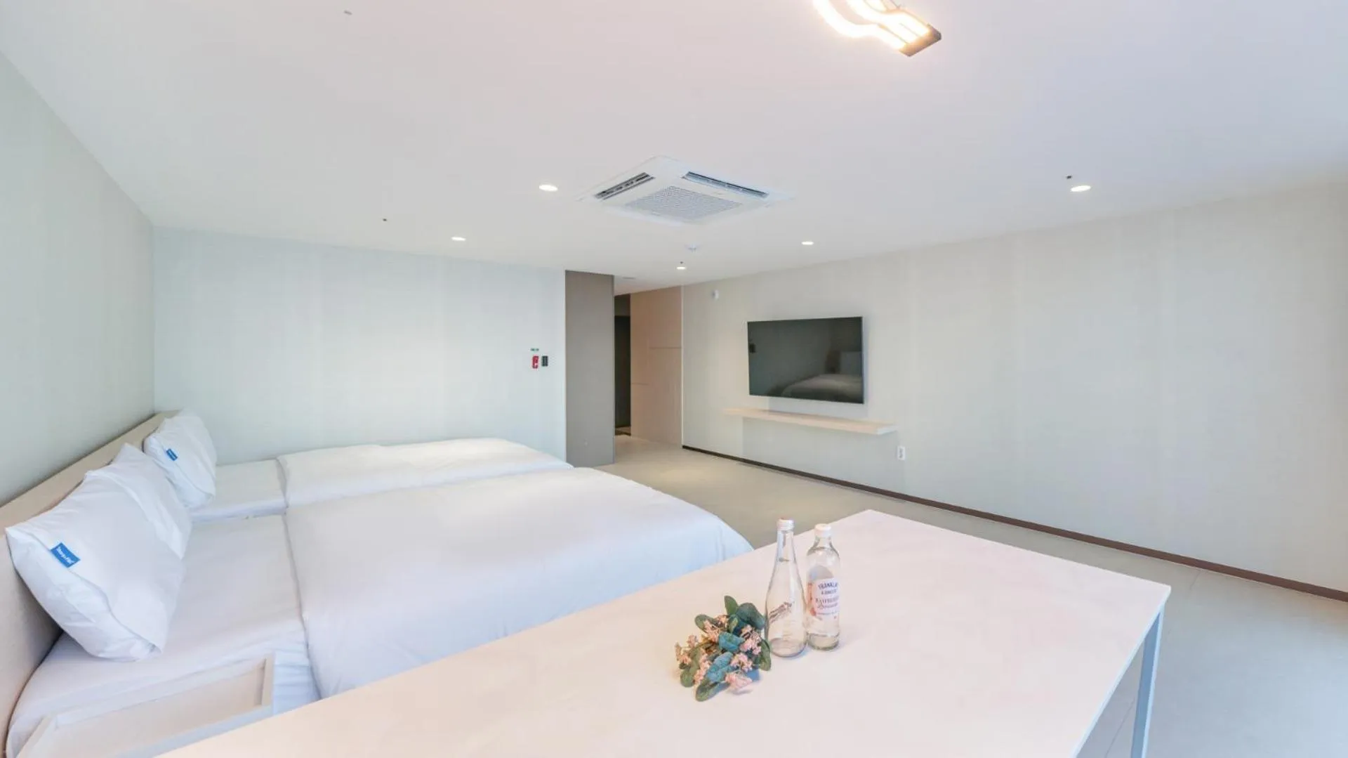 Bed in Sharp & Flat Hotel