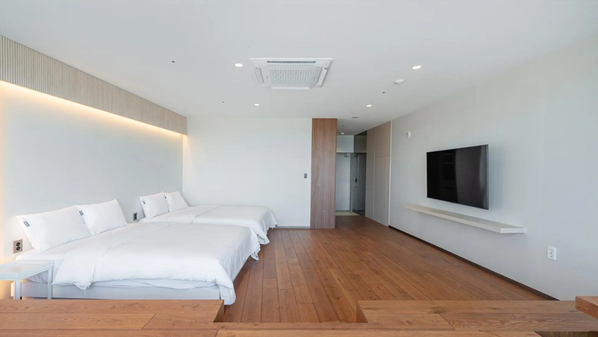 Bed in Sharp & Flat Hotel