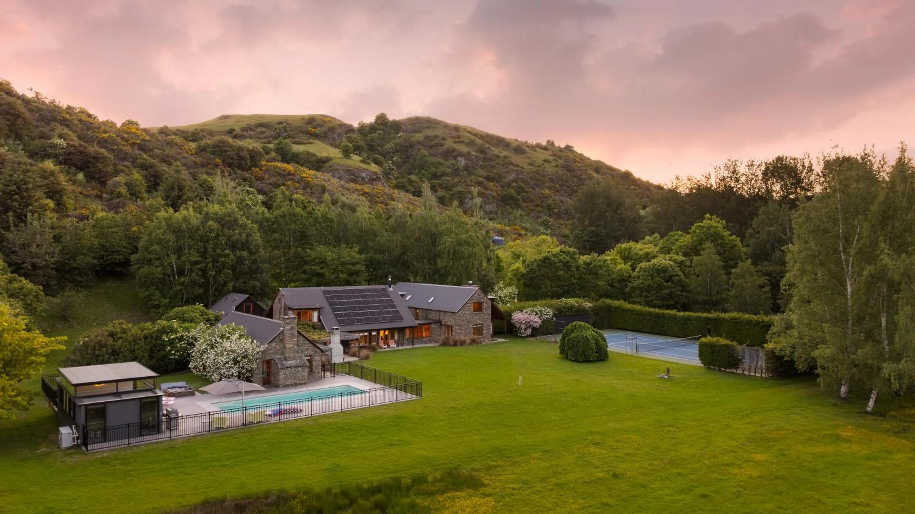 Swimming pool in Wharenui Holiday Home by MajorDomo