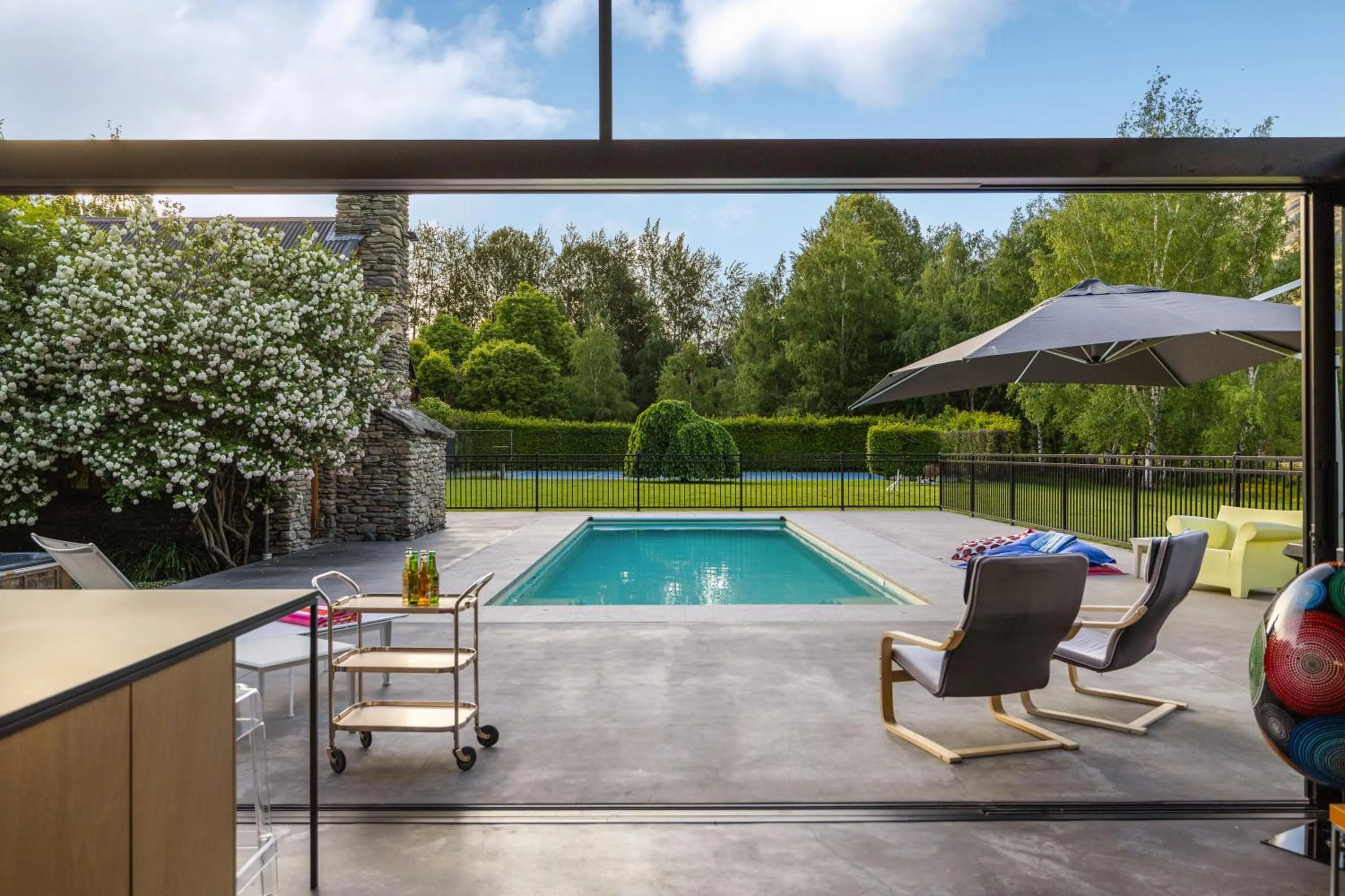 Swimming pool in Wharenui Holiday Home by MajorDomo