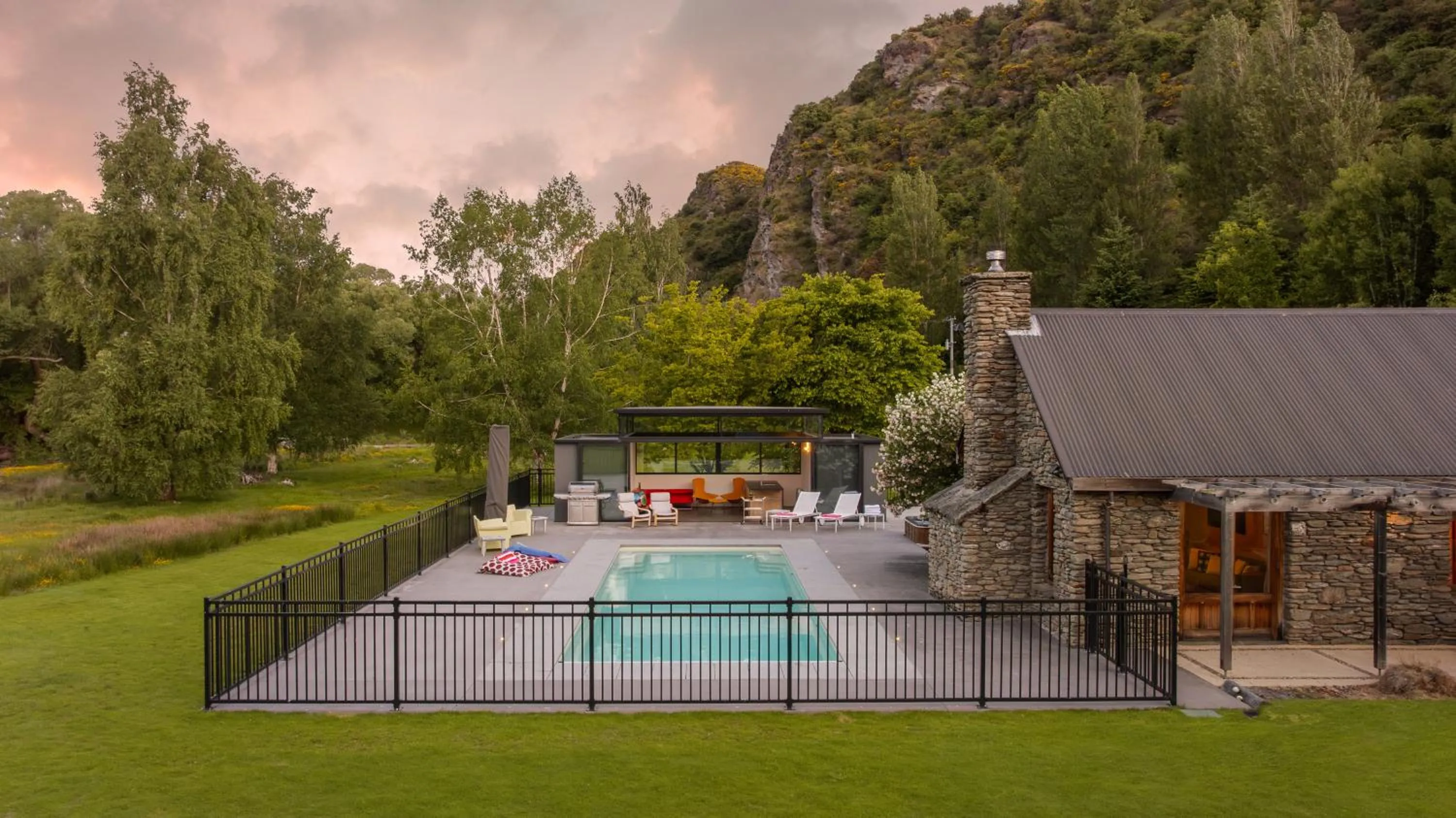 Swimming pool in Wharenui Holiday Home by MajorDomo