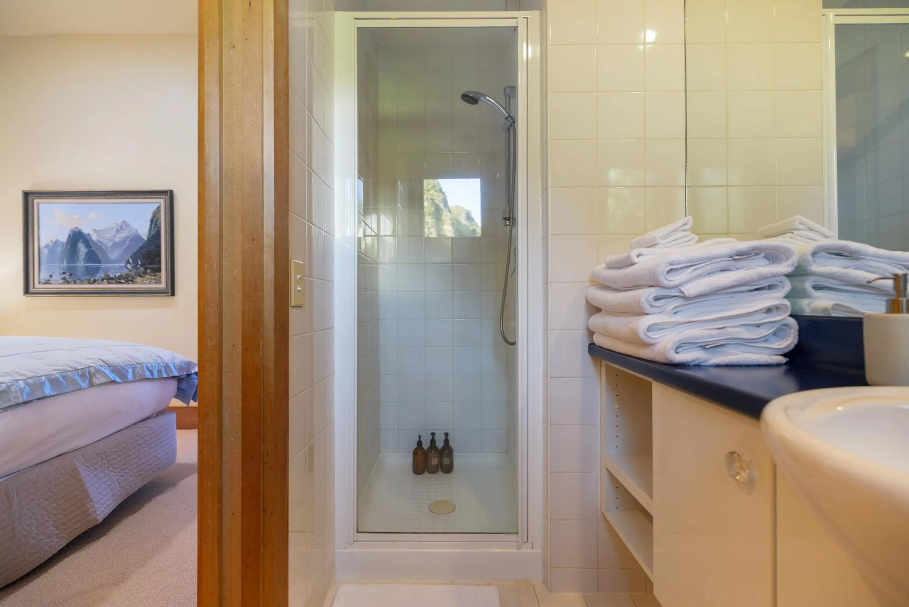 Shower, Bed in Wharenui Holiday Home by MajorDomo