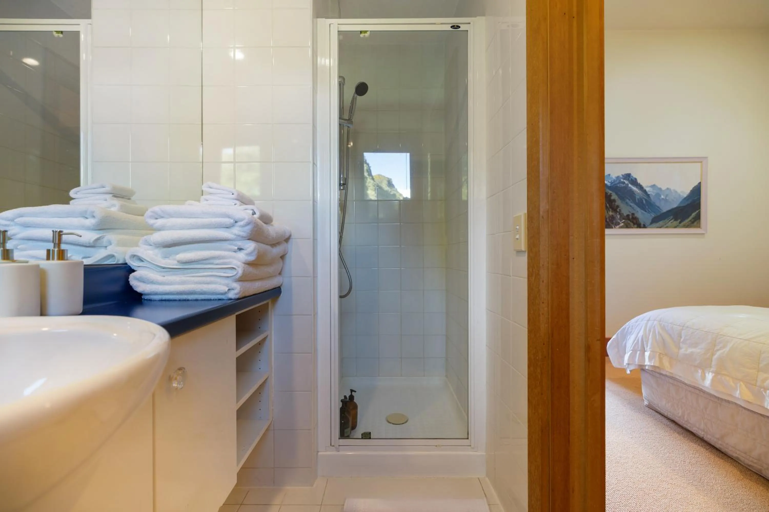 Shower, Bed in Wharenui Holiday Home by MajorDomo