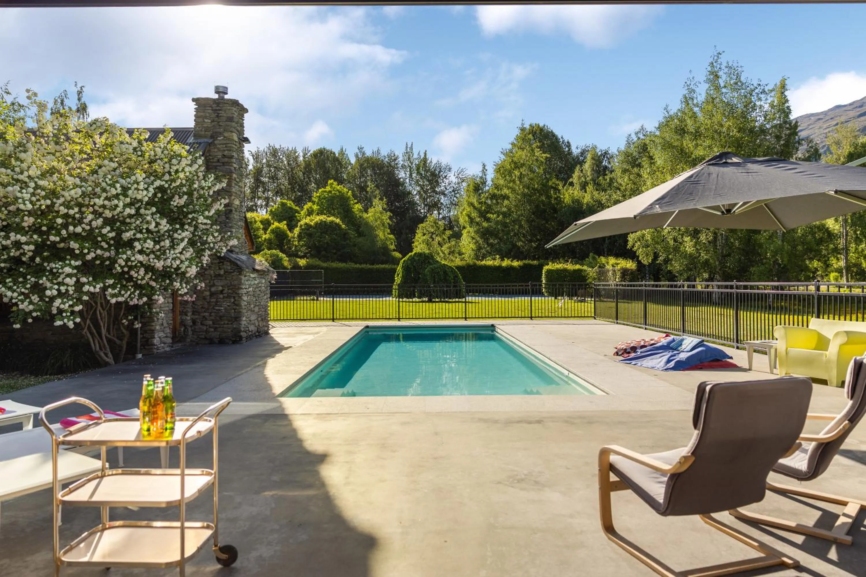 Swimming pool in Wharenui Holiday Home by MajorDomo