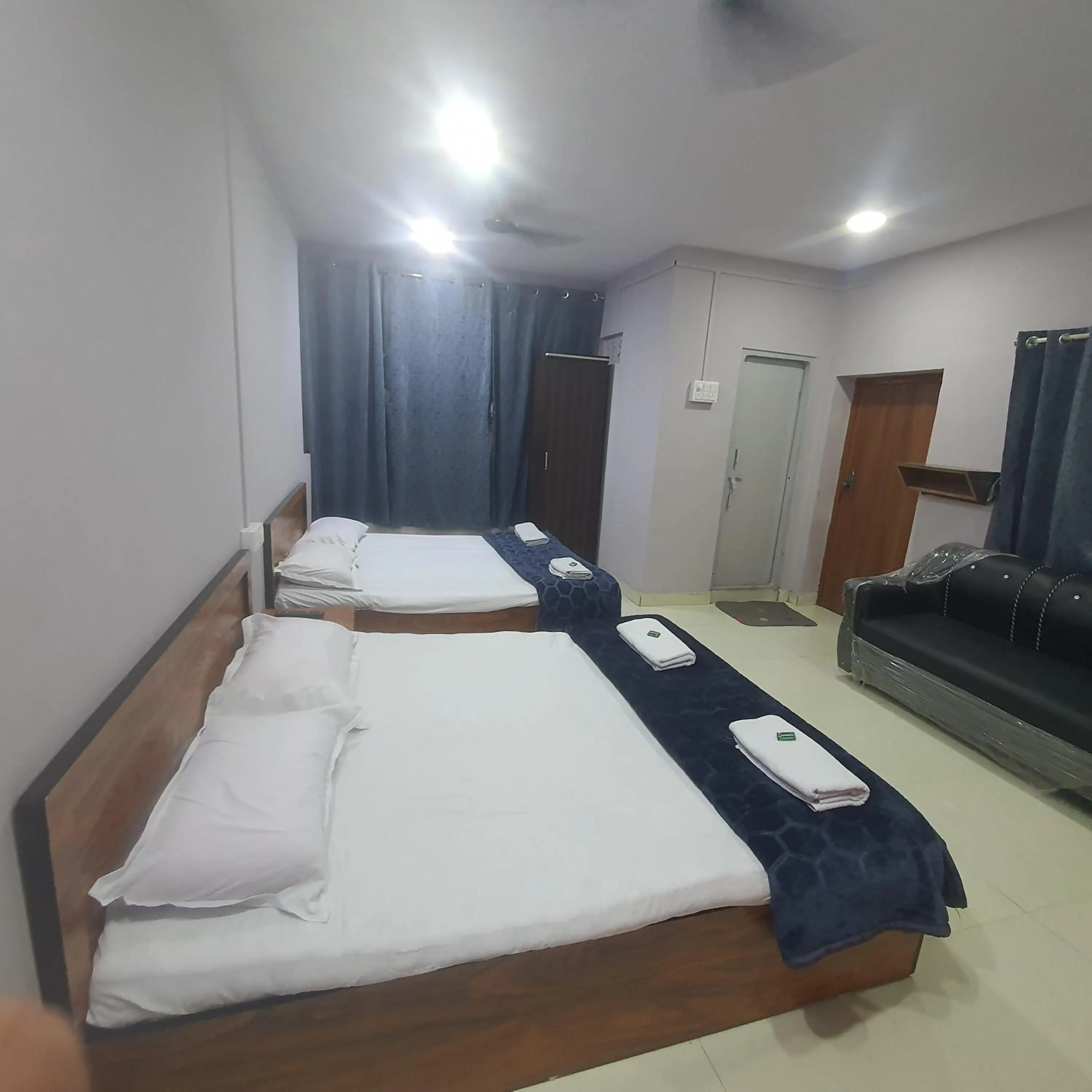 Bed in Hotel Family Stay Beside Railway Station