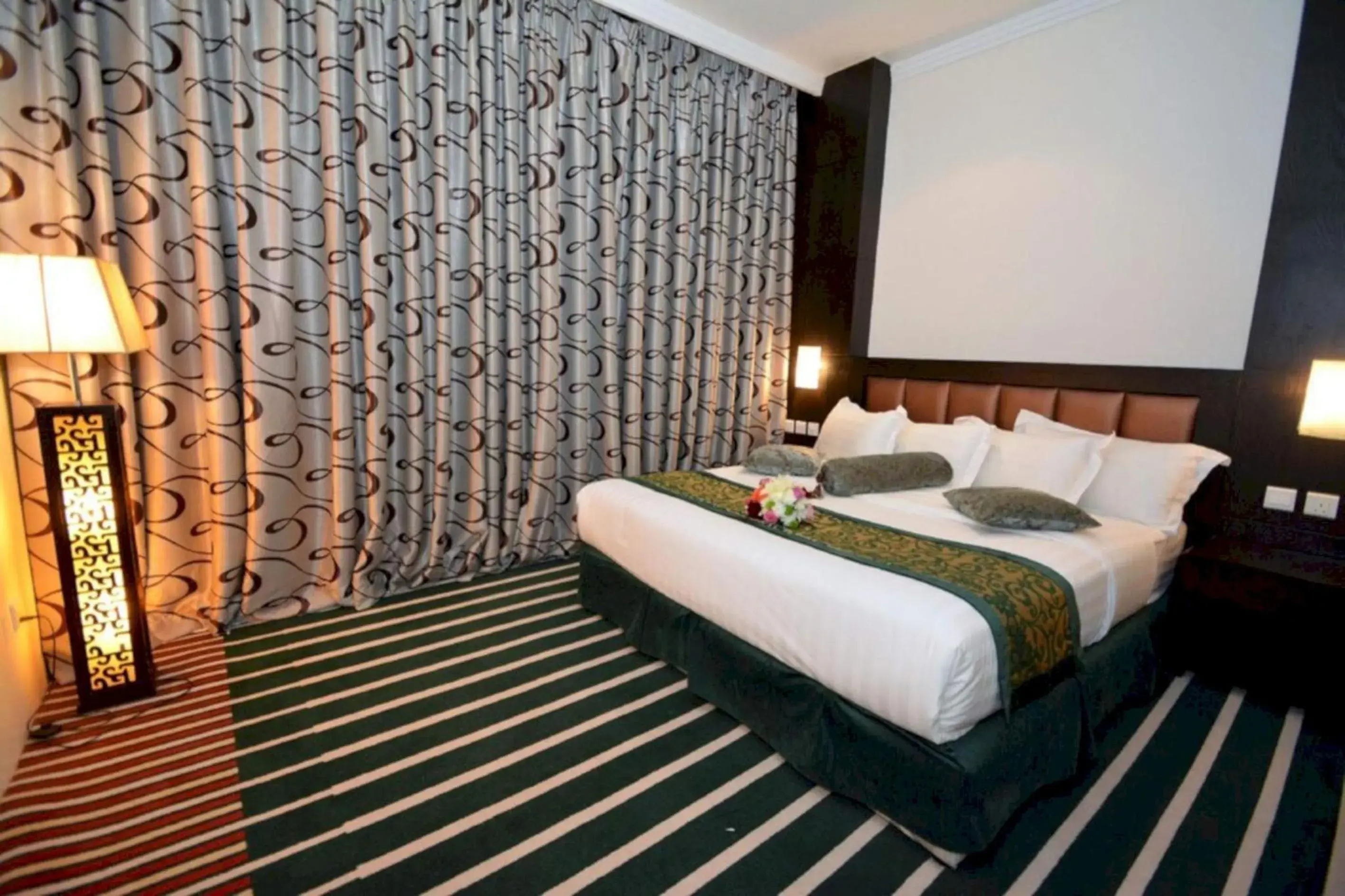 Deluxe King Room in Sunday Millennia Hotel Deluxe King Room in Sunday Millennia Hotel