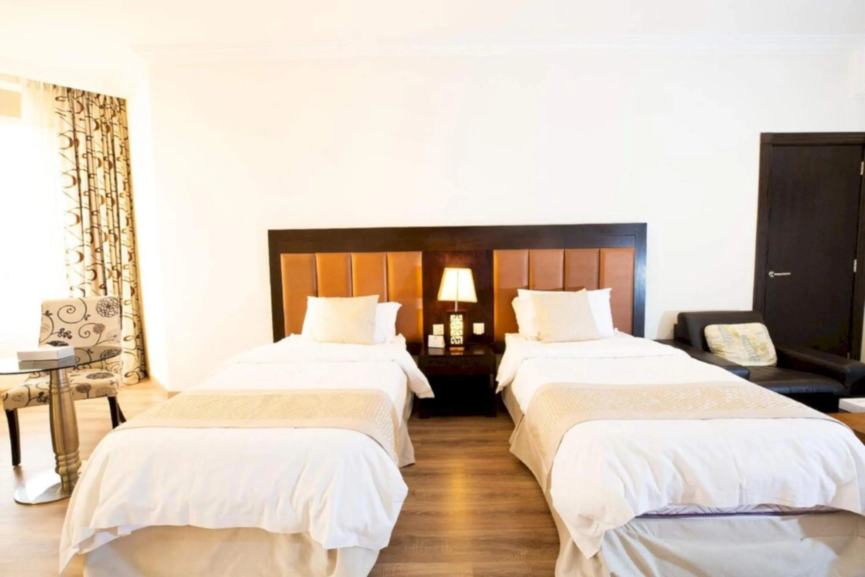 Photo of the whole room, Bed in Sunday Millennia Hotel