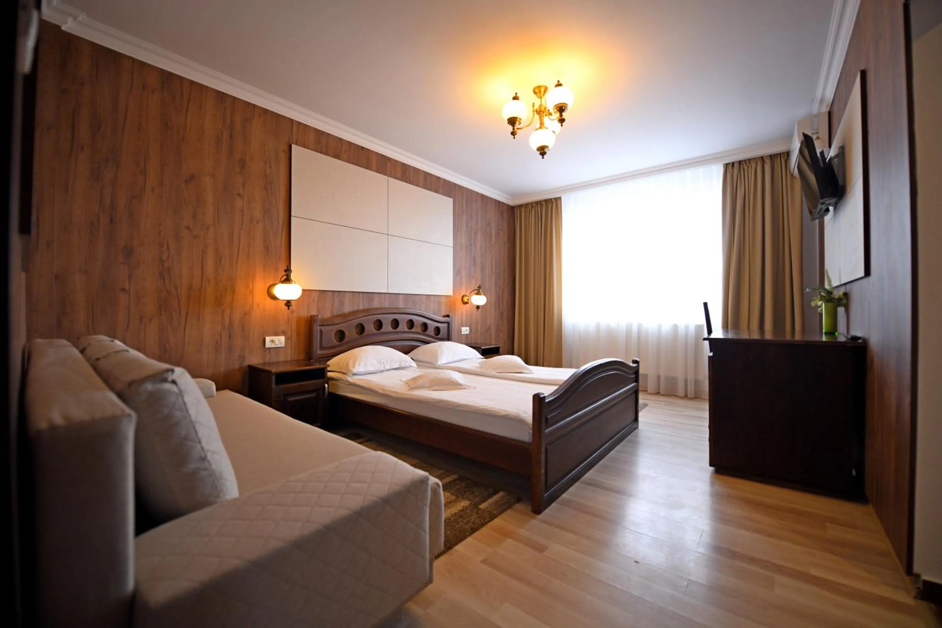 Photo of the whole room, Bed in Pensiunea Sarmis Cristal