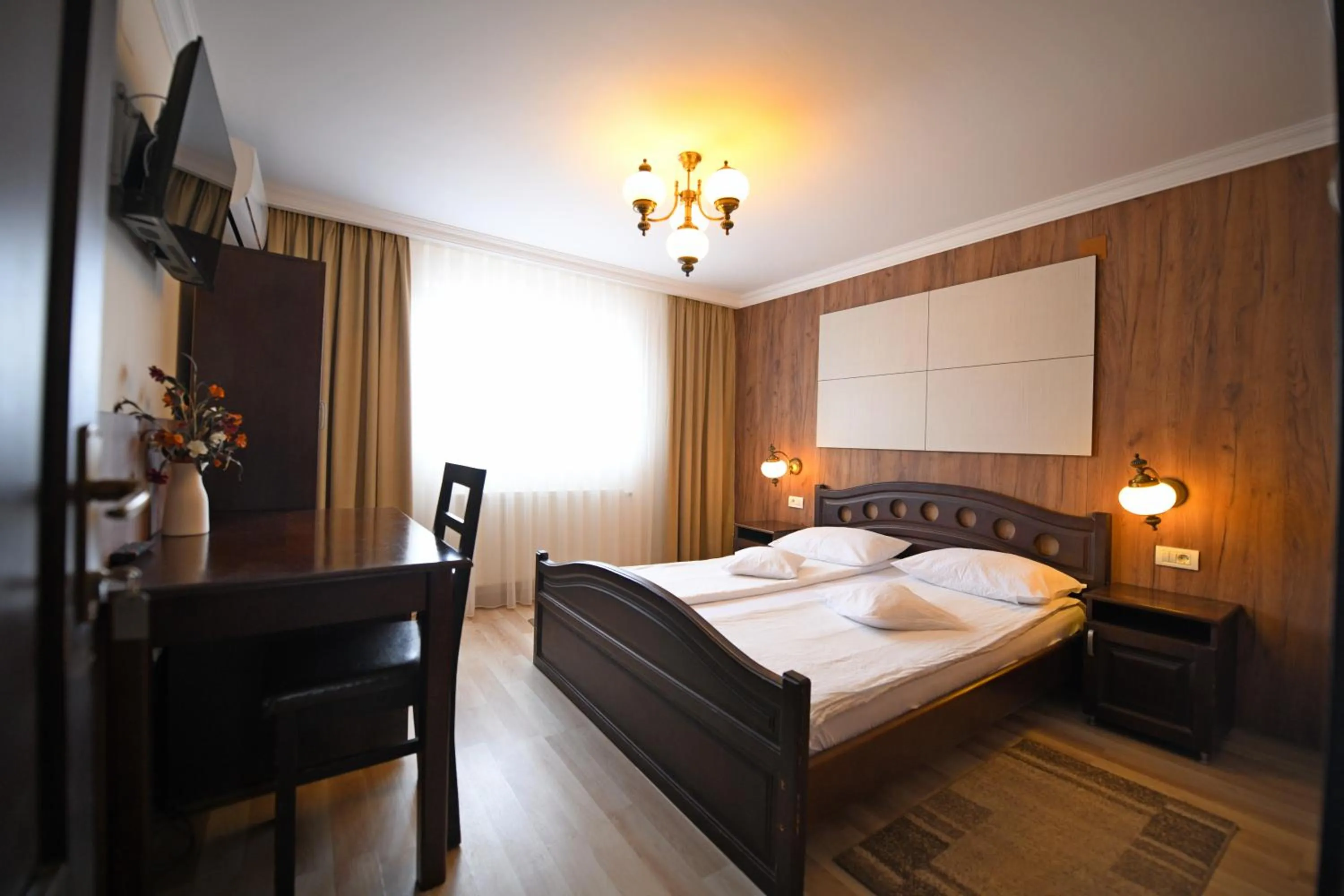 Photo of the whole room, Bed in Pensiunea Sarmis Cristal