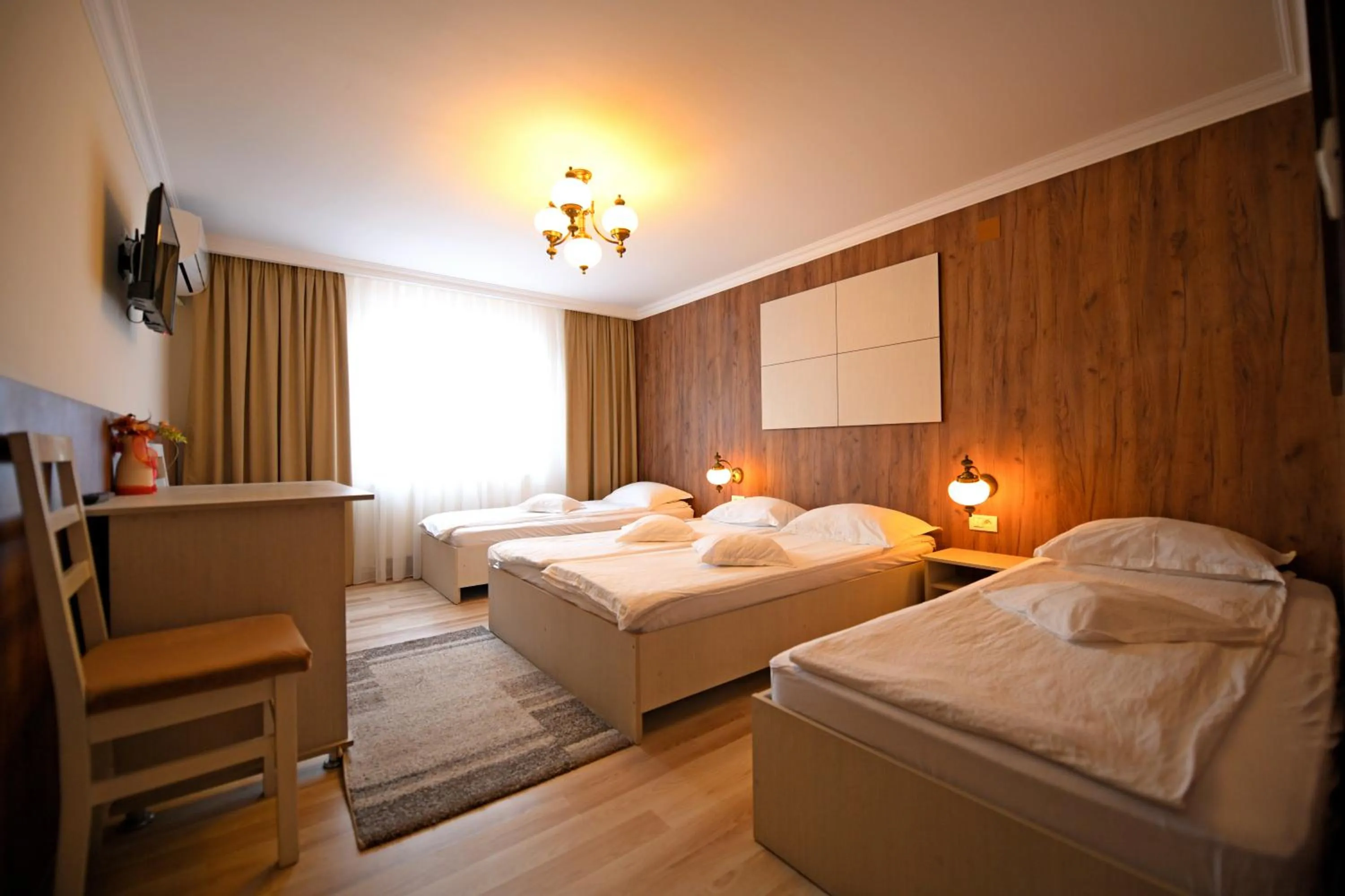 Photo of the whole room, Bed in Pensiunea Sarmis Cristal