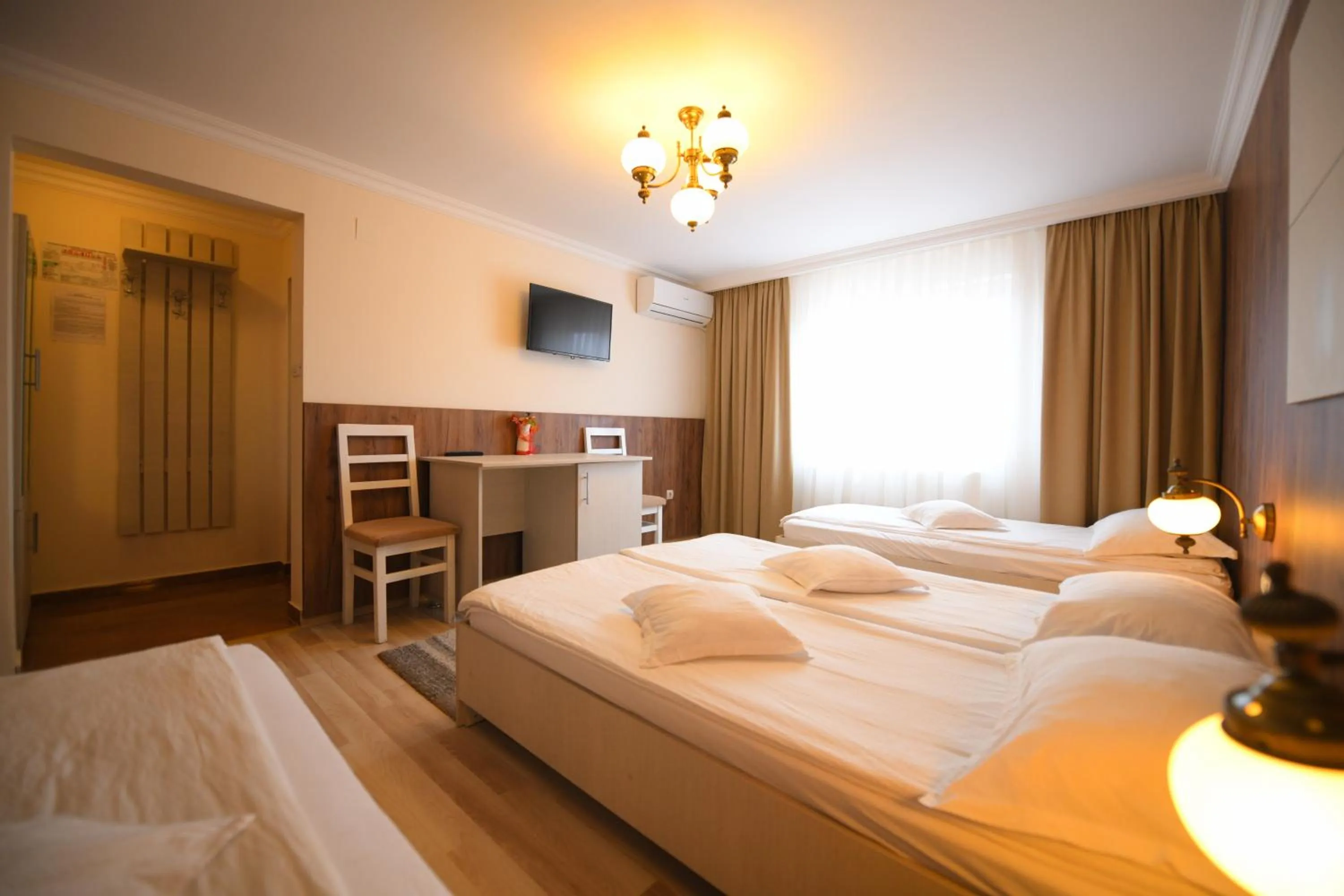 Photo of the whole room, Bed in Pensiunea Sarmis Cristal