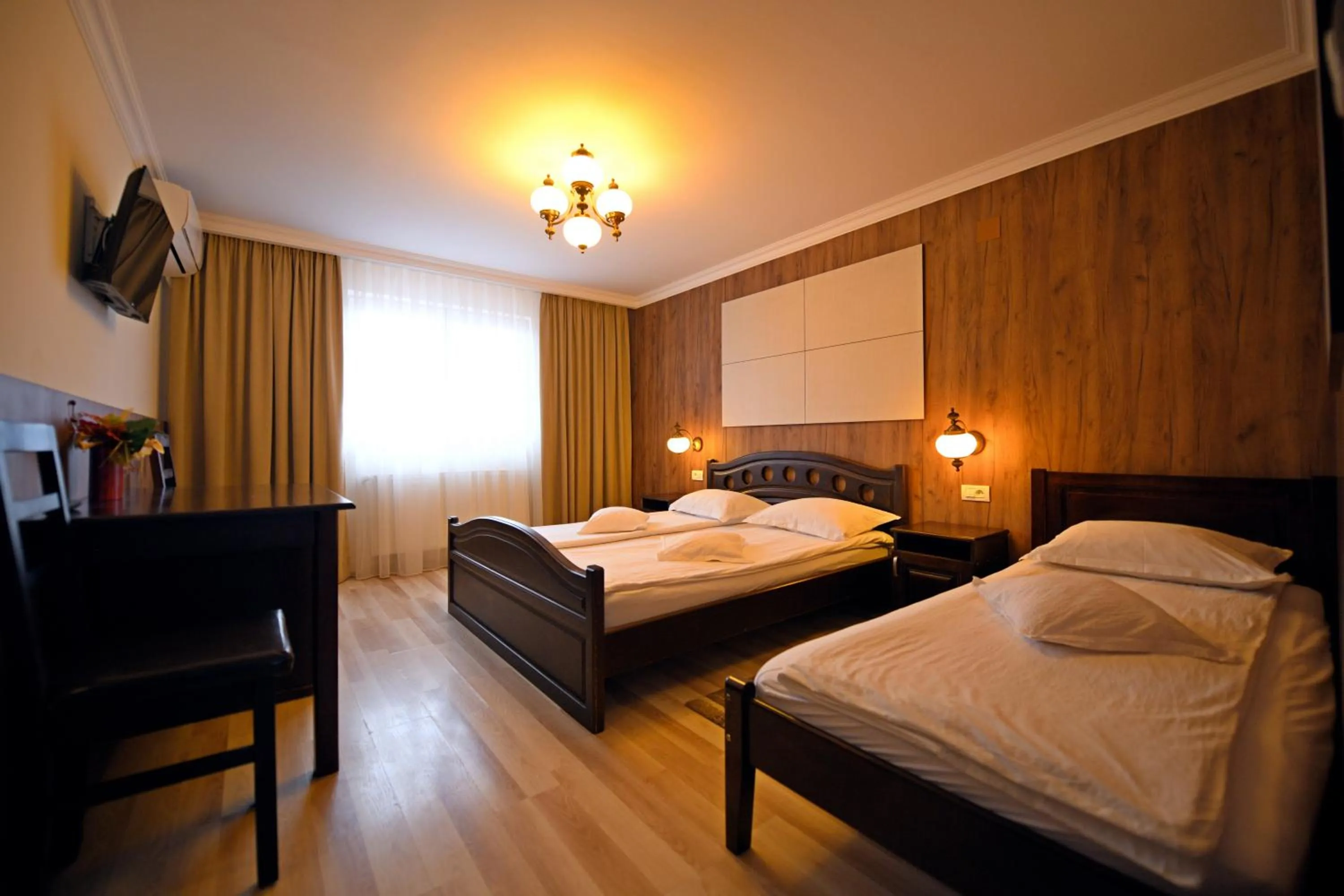 Photo of the whole room, Bed in Pensiunea Sarmis Cristal