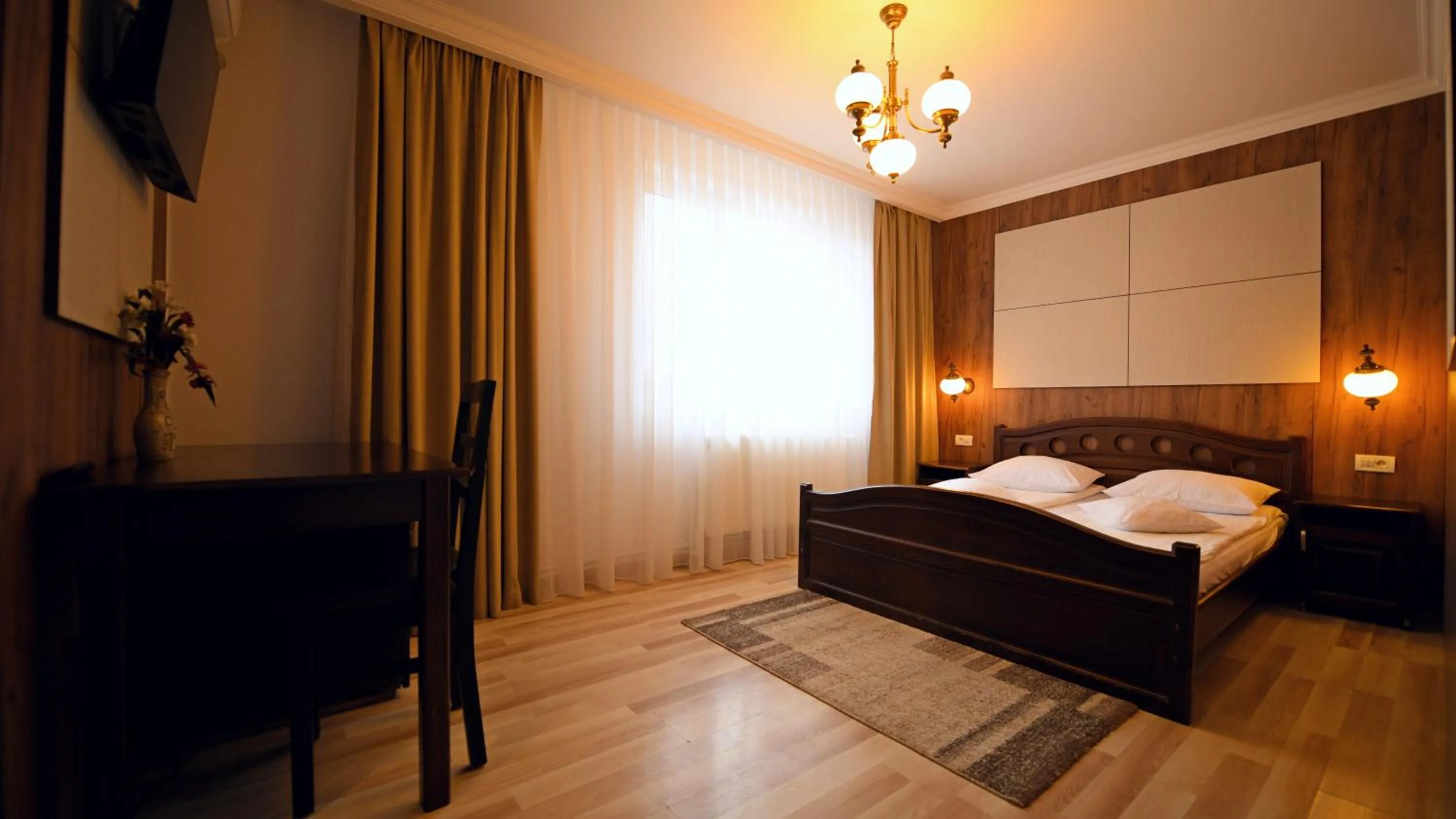 Photo of the whole room, Bed in Pensiunea Sarmis Cristal