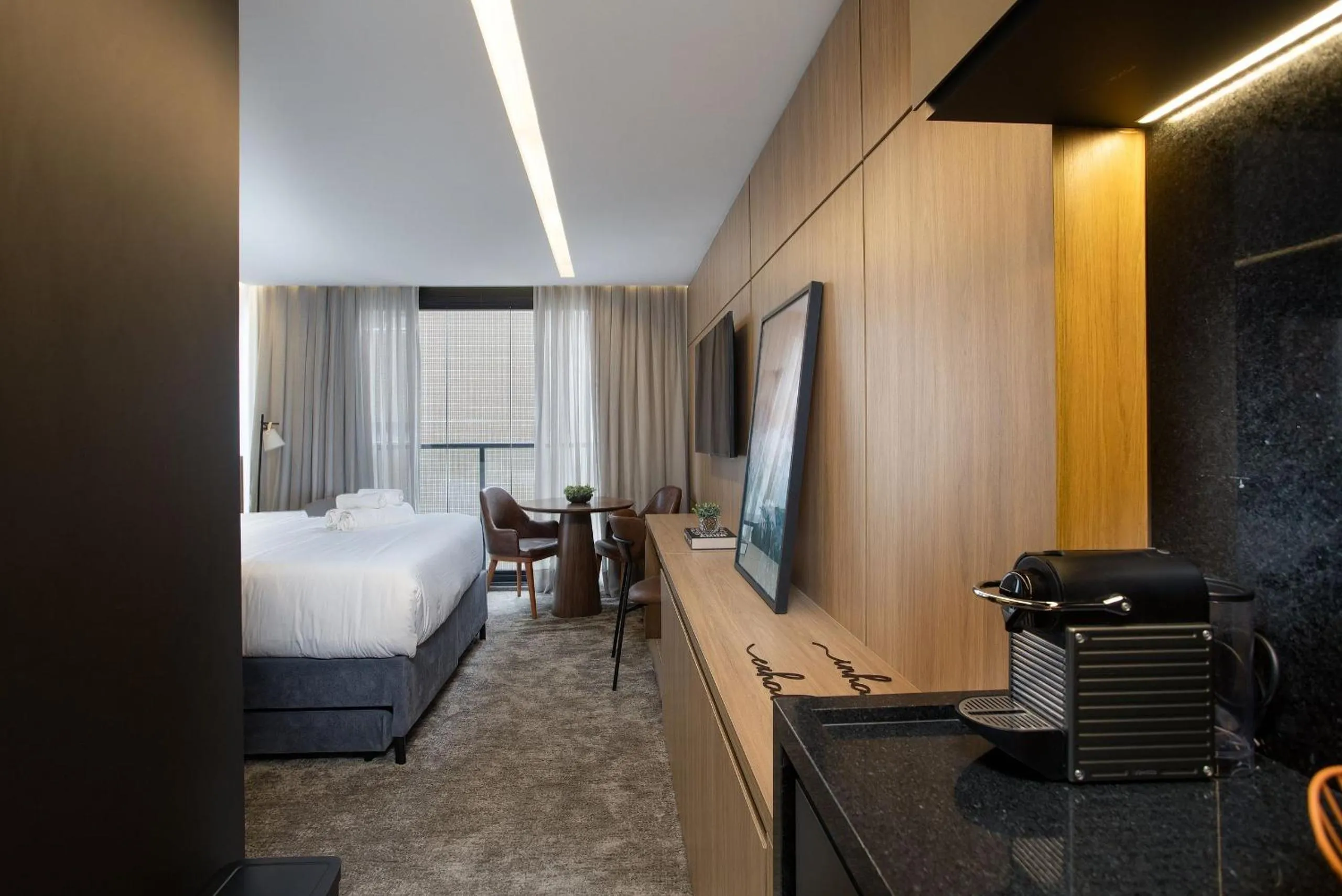 Kitchen or kitchenette, Bed in Hit Itaim