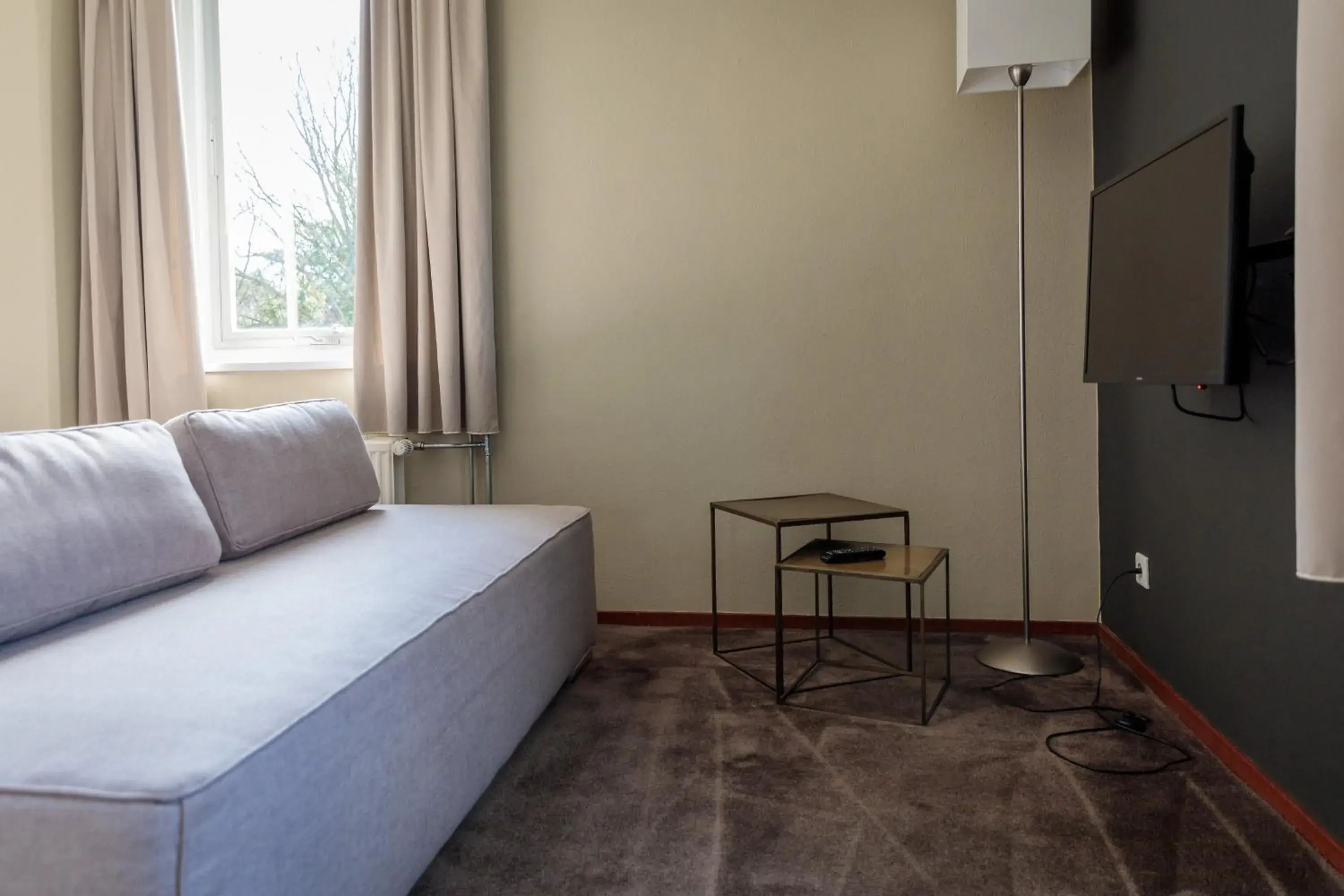 Seating area, Bed in Fletcher Kloosterhotel Willibrordhaeghe Seating area, Bed in Fletcher Kloosterhotel Willibrordhaeghe