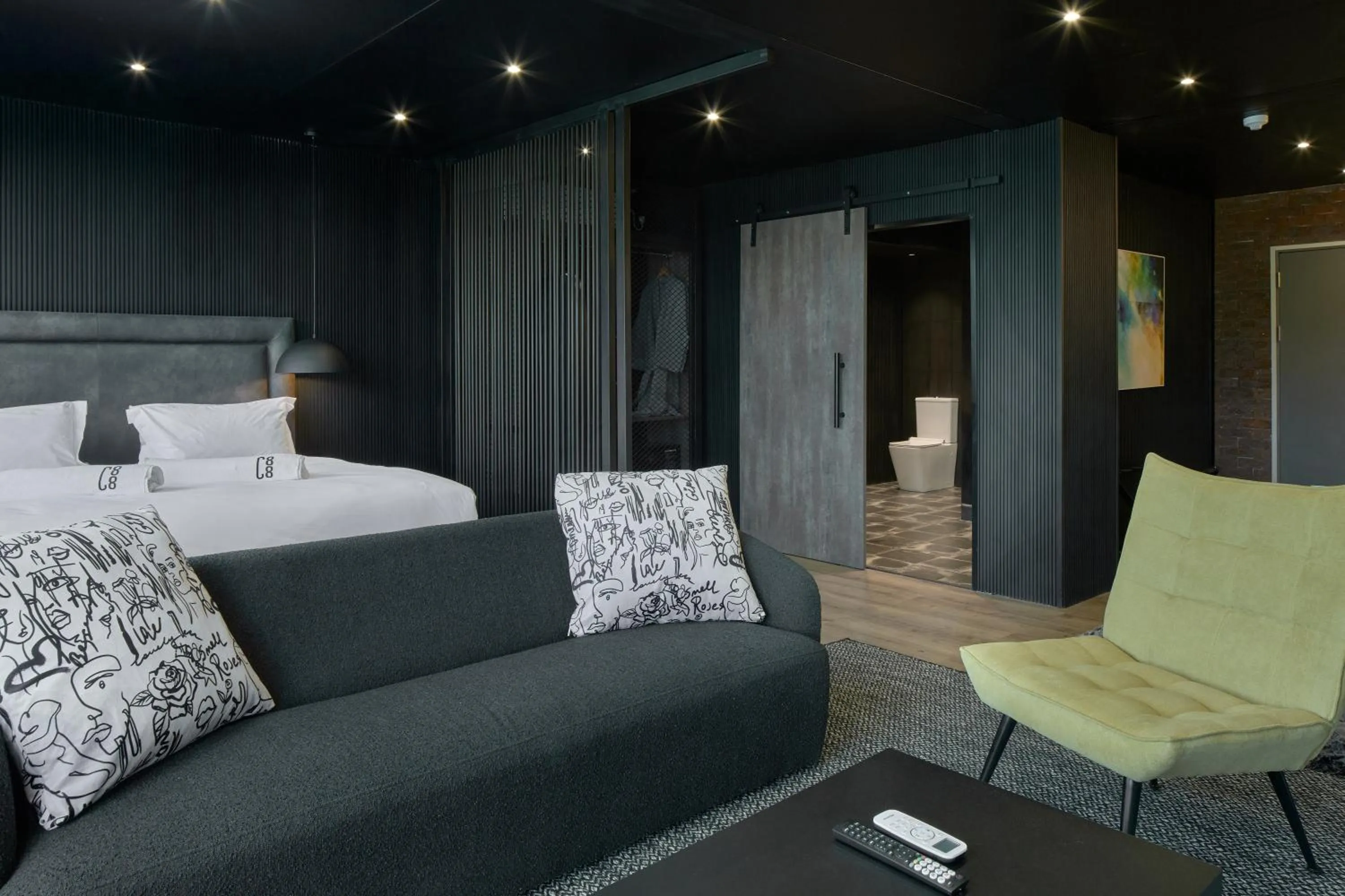 Living room, Bed in Cargo88 Hotel