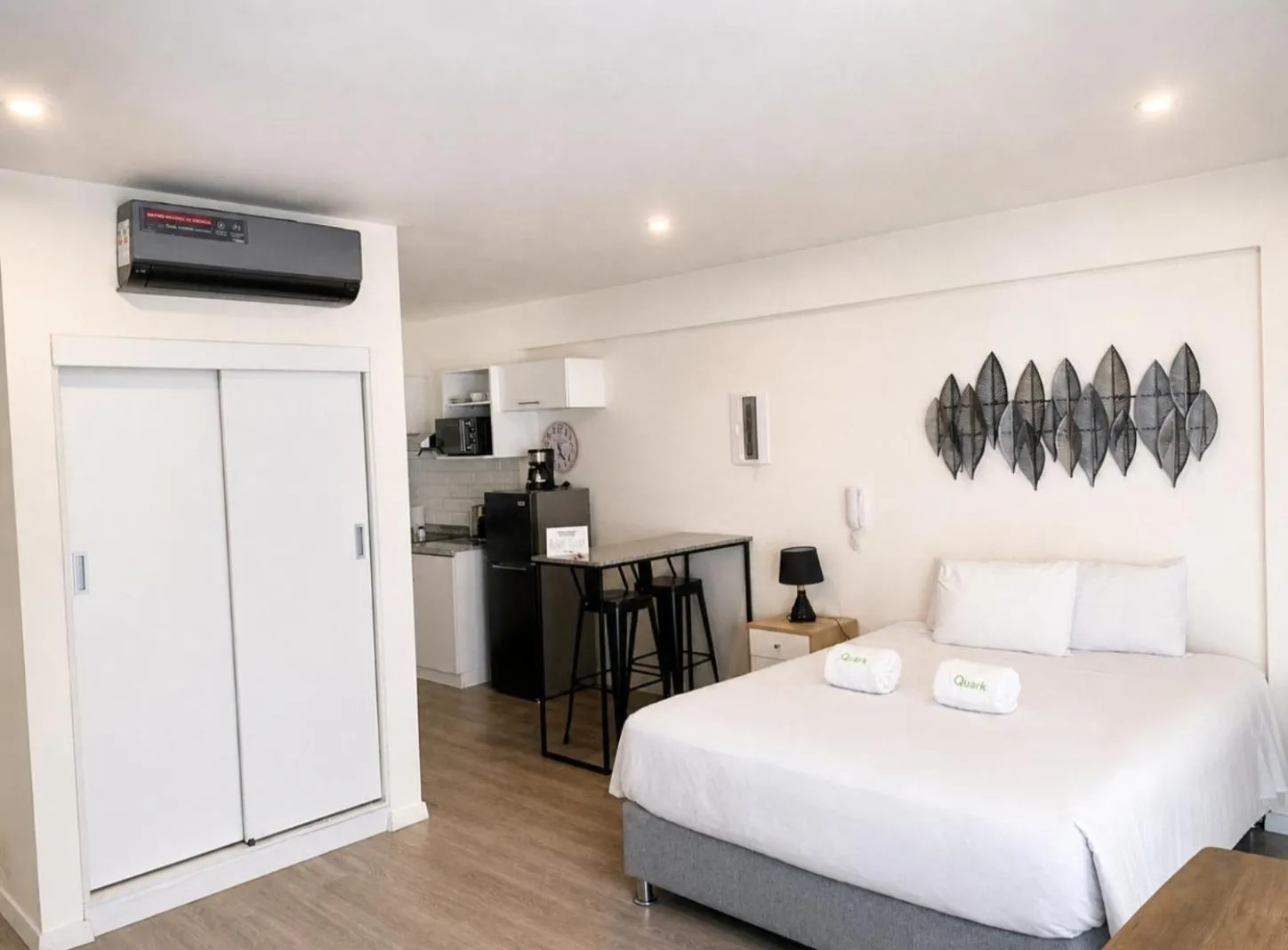 air conditioner, Bed in Quark Apartments