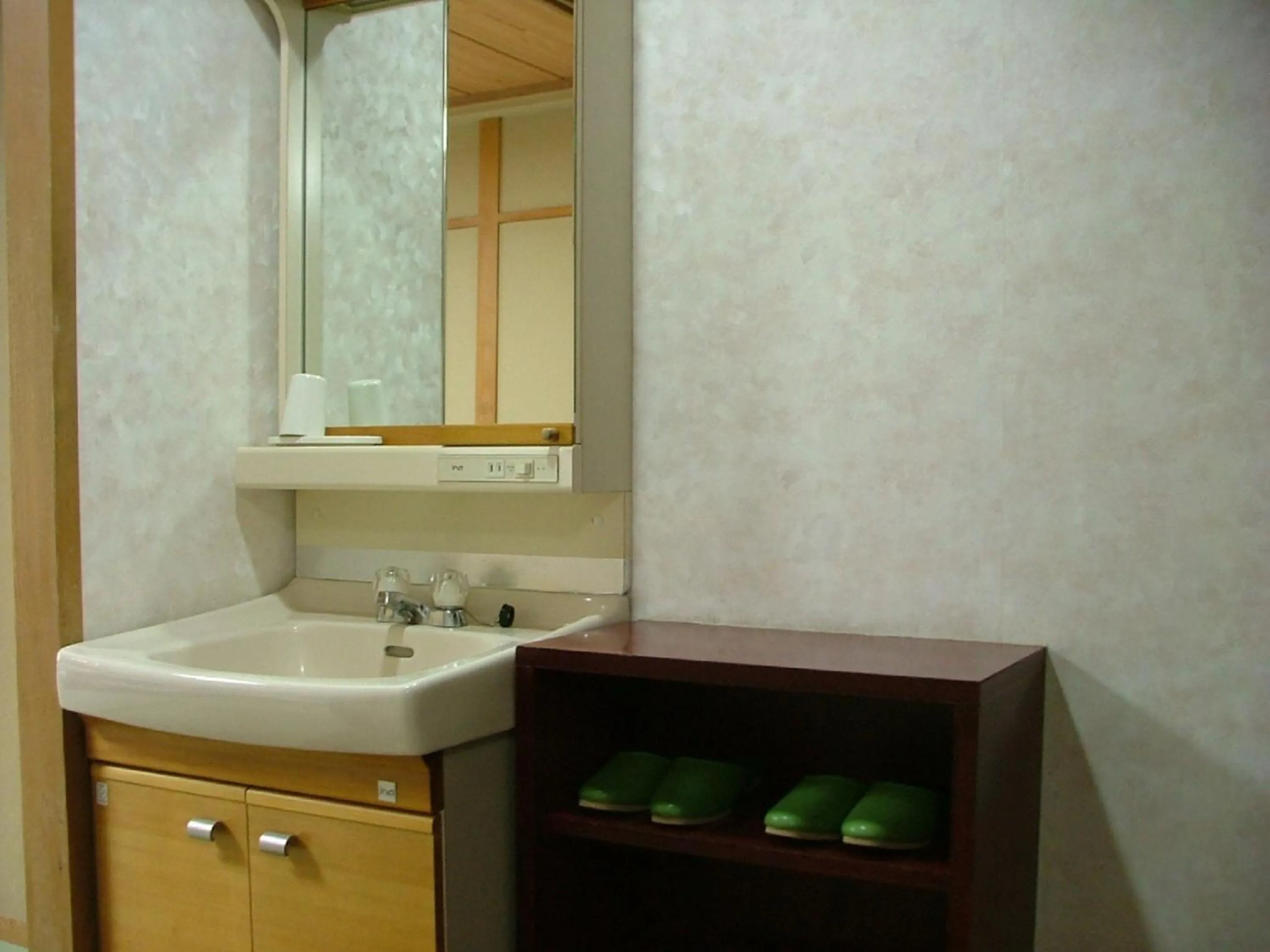 Bathroom in Miyajima Hotel New Kotobuki