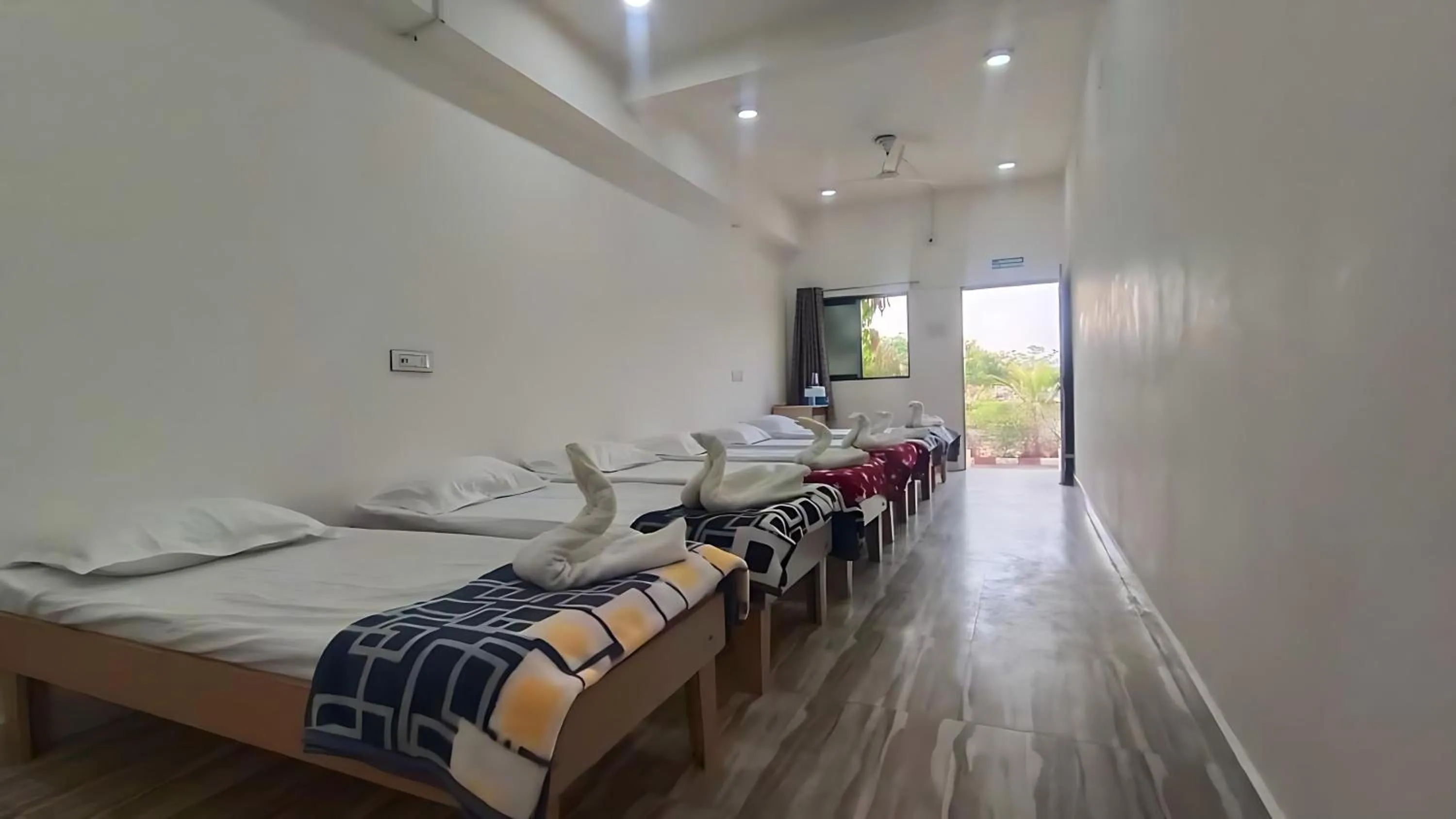 Photo of the whole room, Bed in AamraKunj Gir Resort