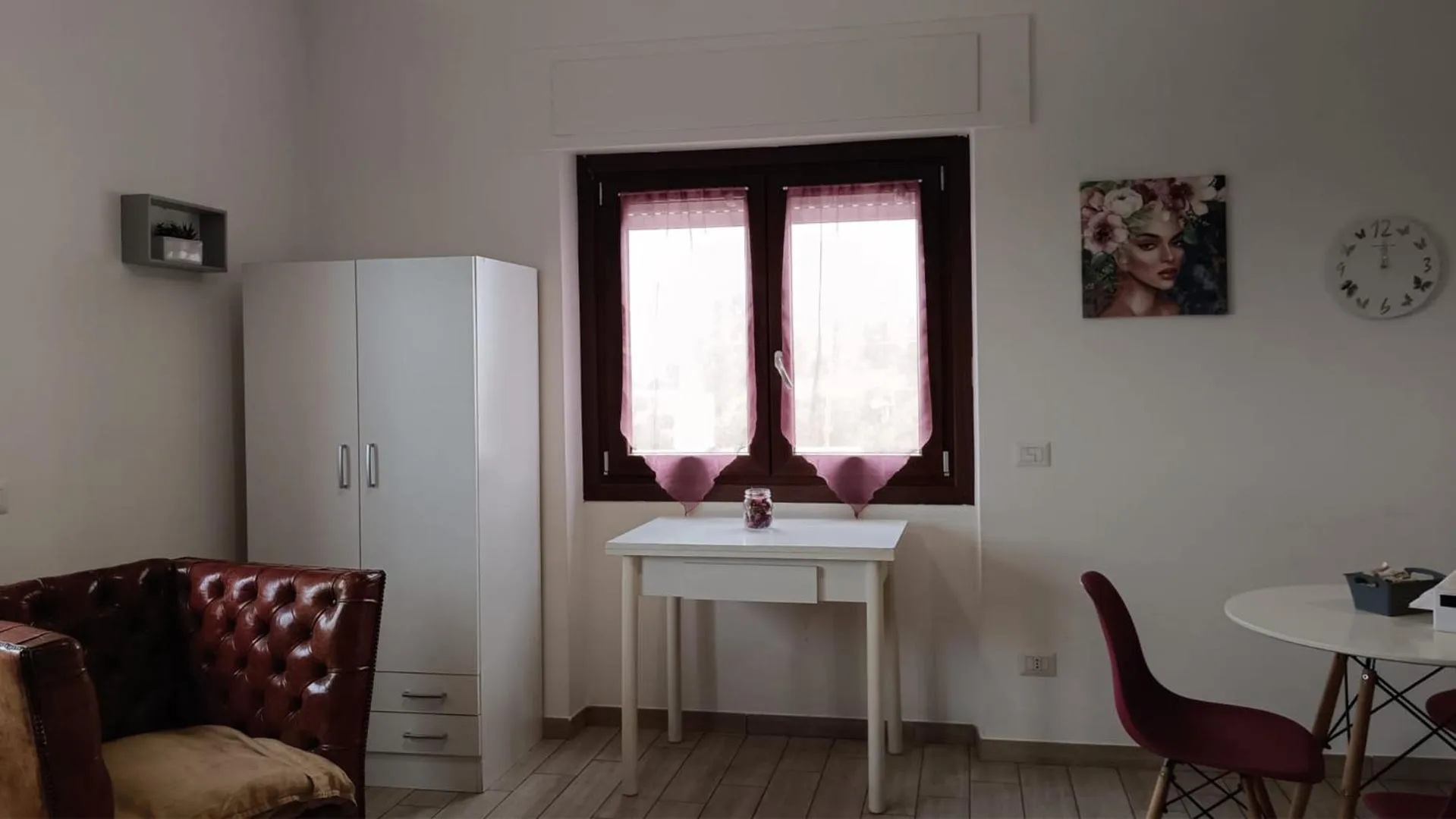 Seating area in Le casette di Frà Studios