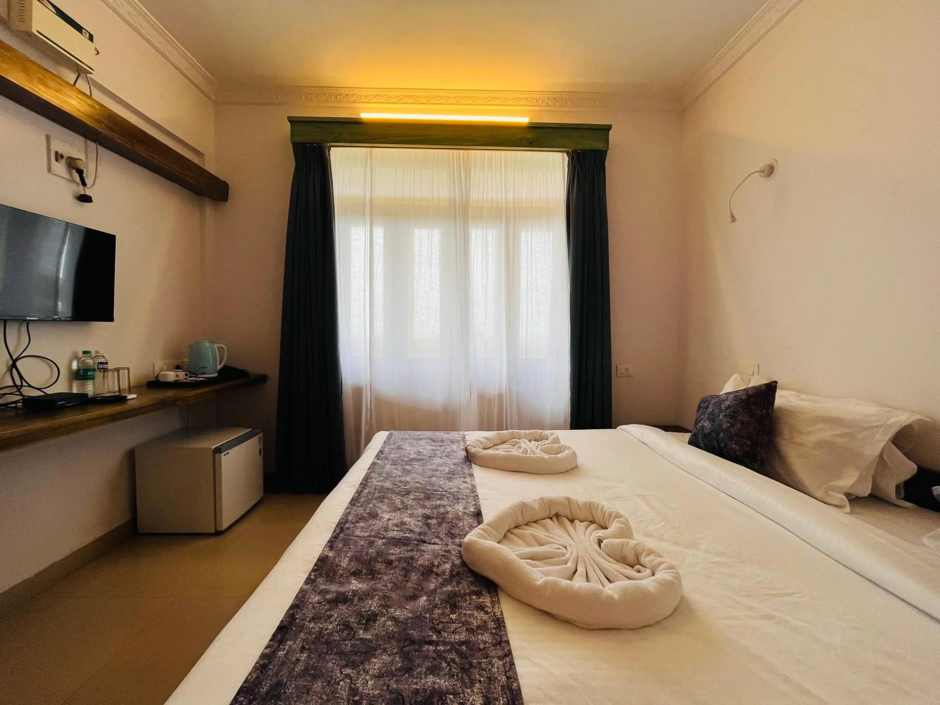 Photo of the whole room, Bed in Nagas Hotel Satyavati Morjim