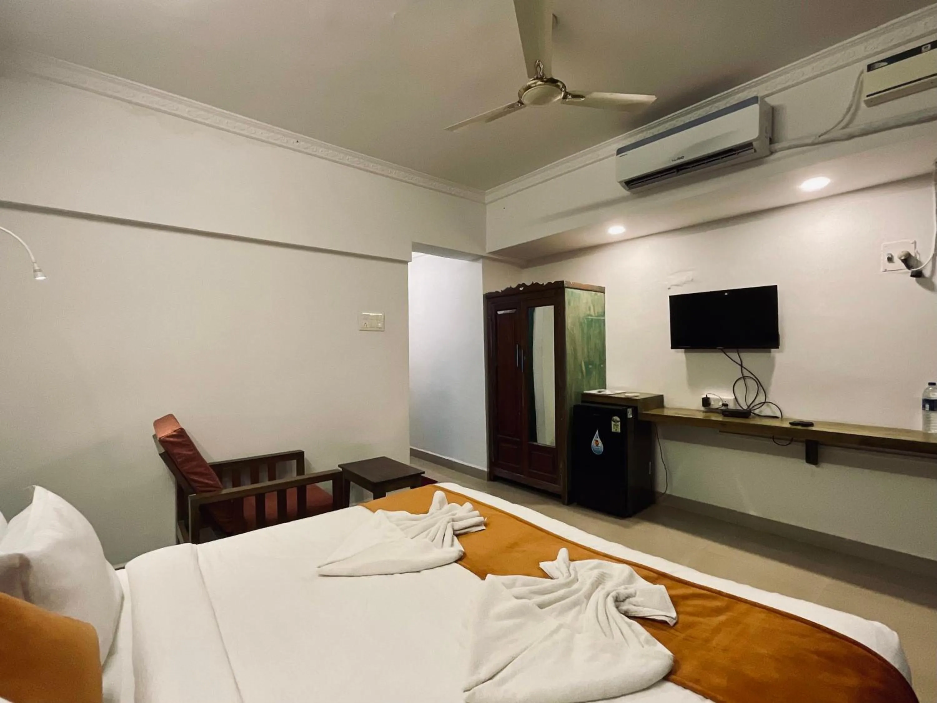 Bed in Nagas Hotel Satyavati Morjim