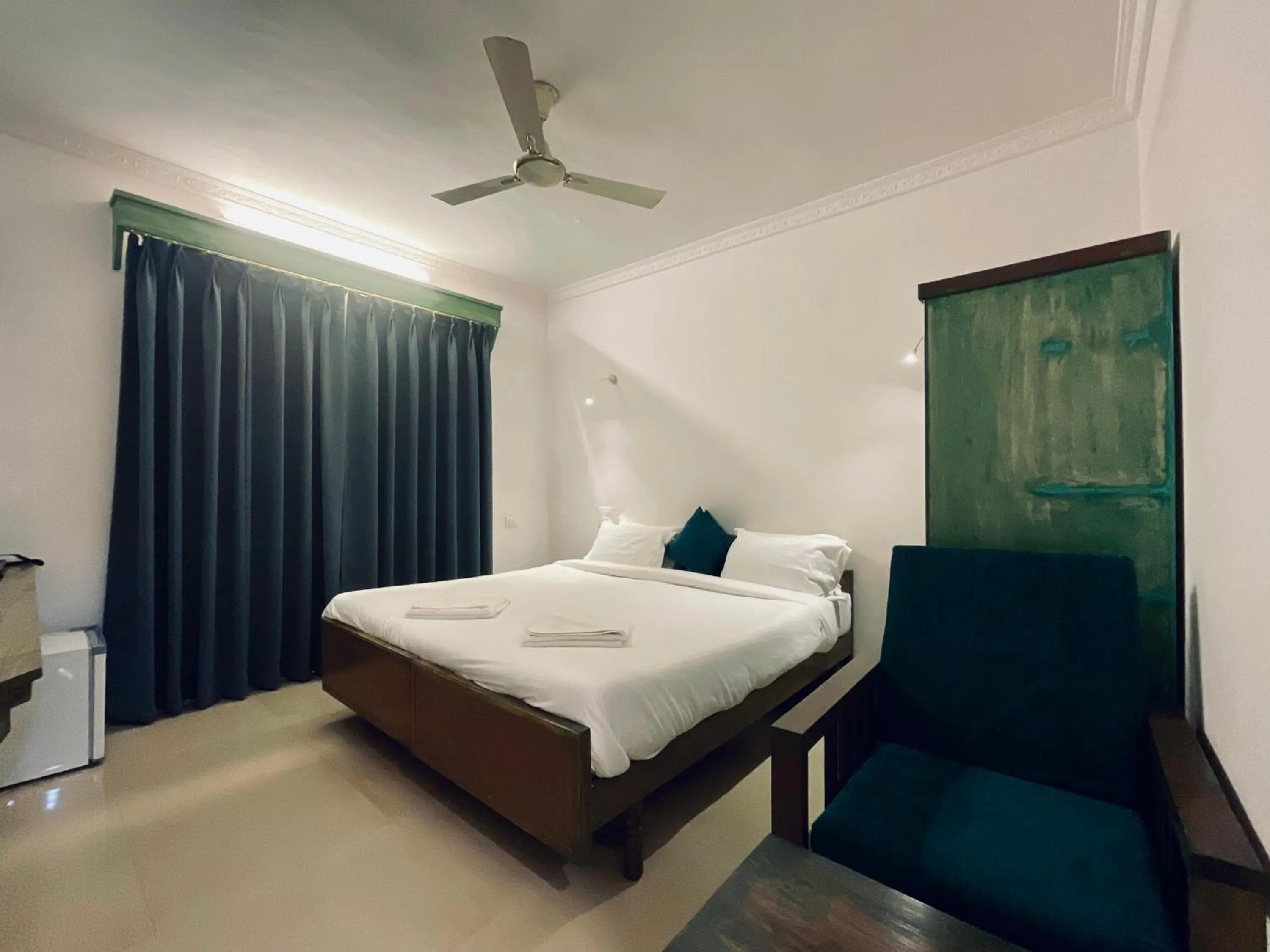 Photo of the whole room, Bed in Nagas Hotel Satyavati Morjim