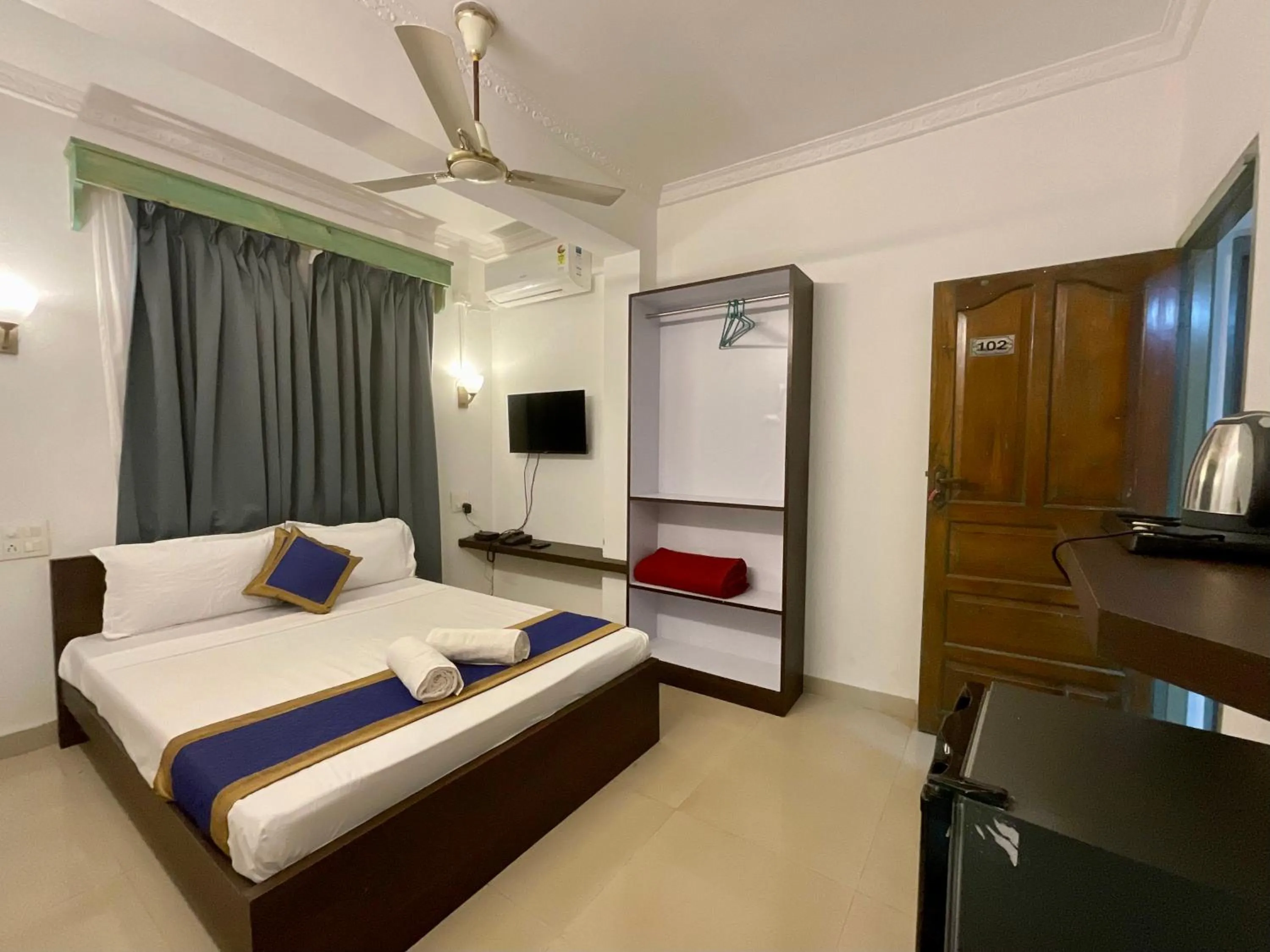 Photo of the whole room, Bed in Nagas Hotel Satyavati Morjim