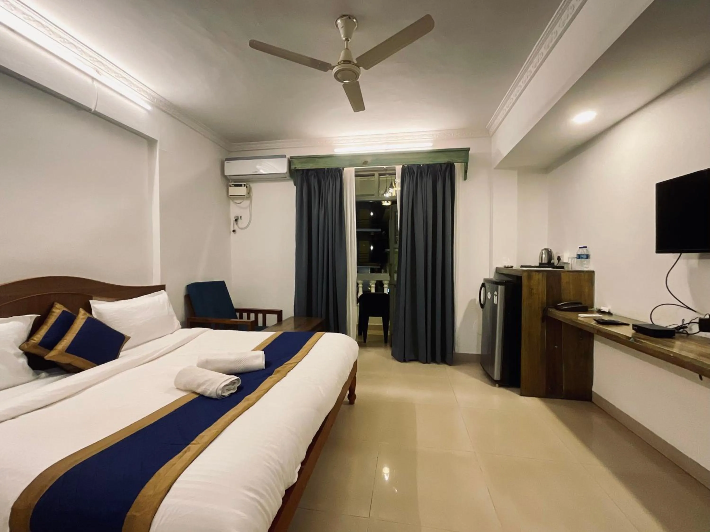 Bed in Nagas Hotel Satyavati Morjim