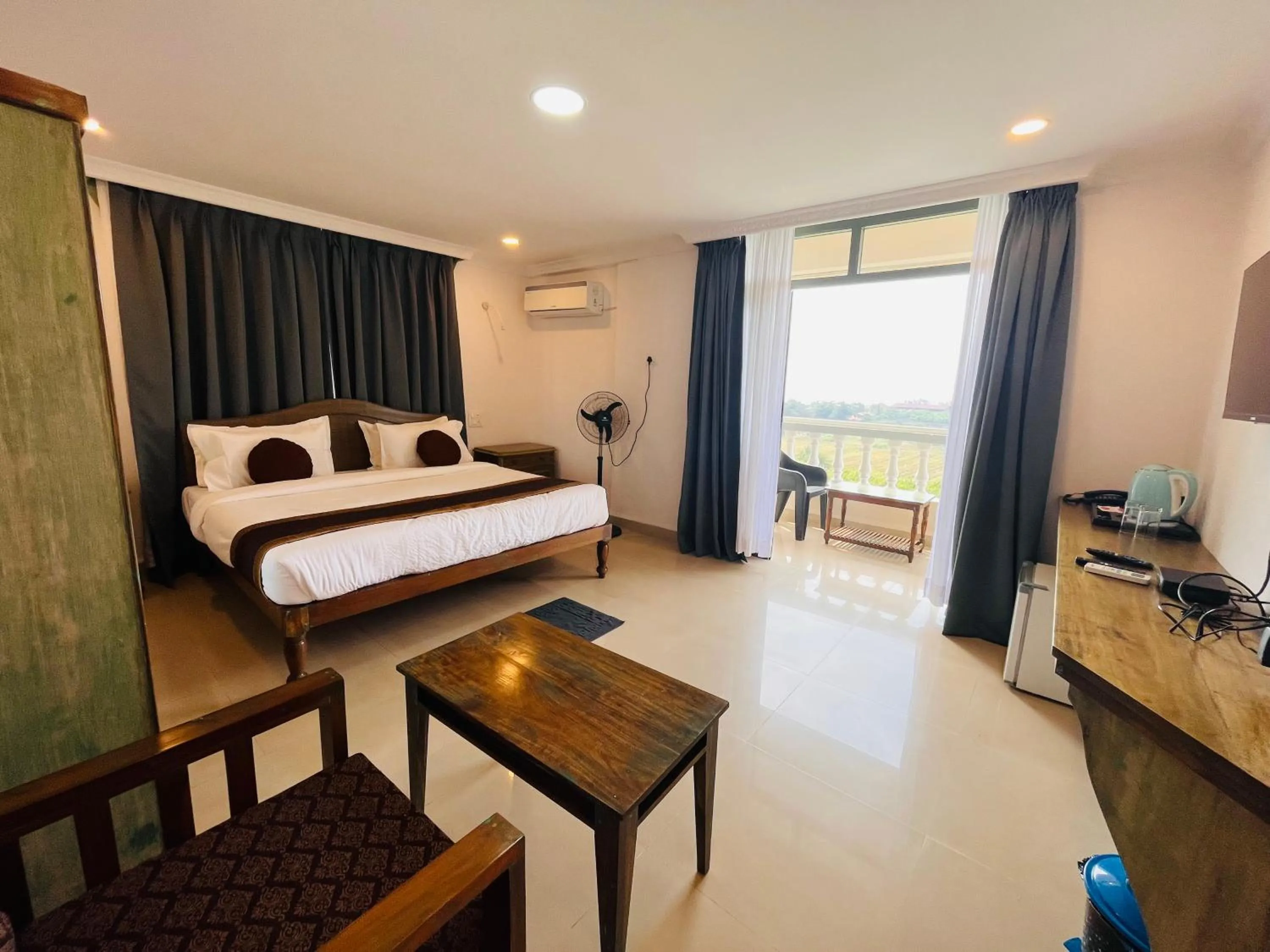 Photo of the whole room, Bed in Nagas Hotel Satyavati Morjim