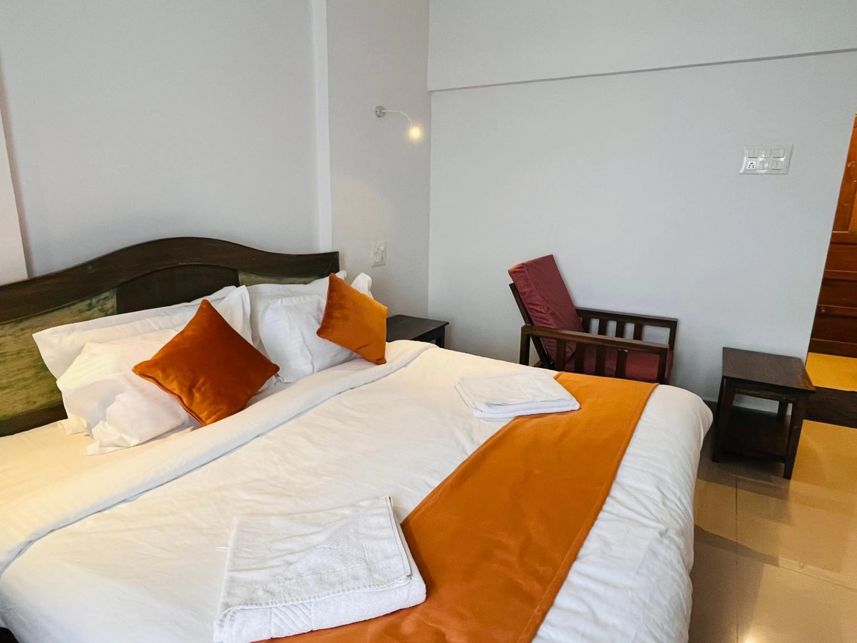 Bed in Nagas Hotel Satyavati Morjim