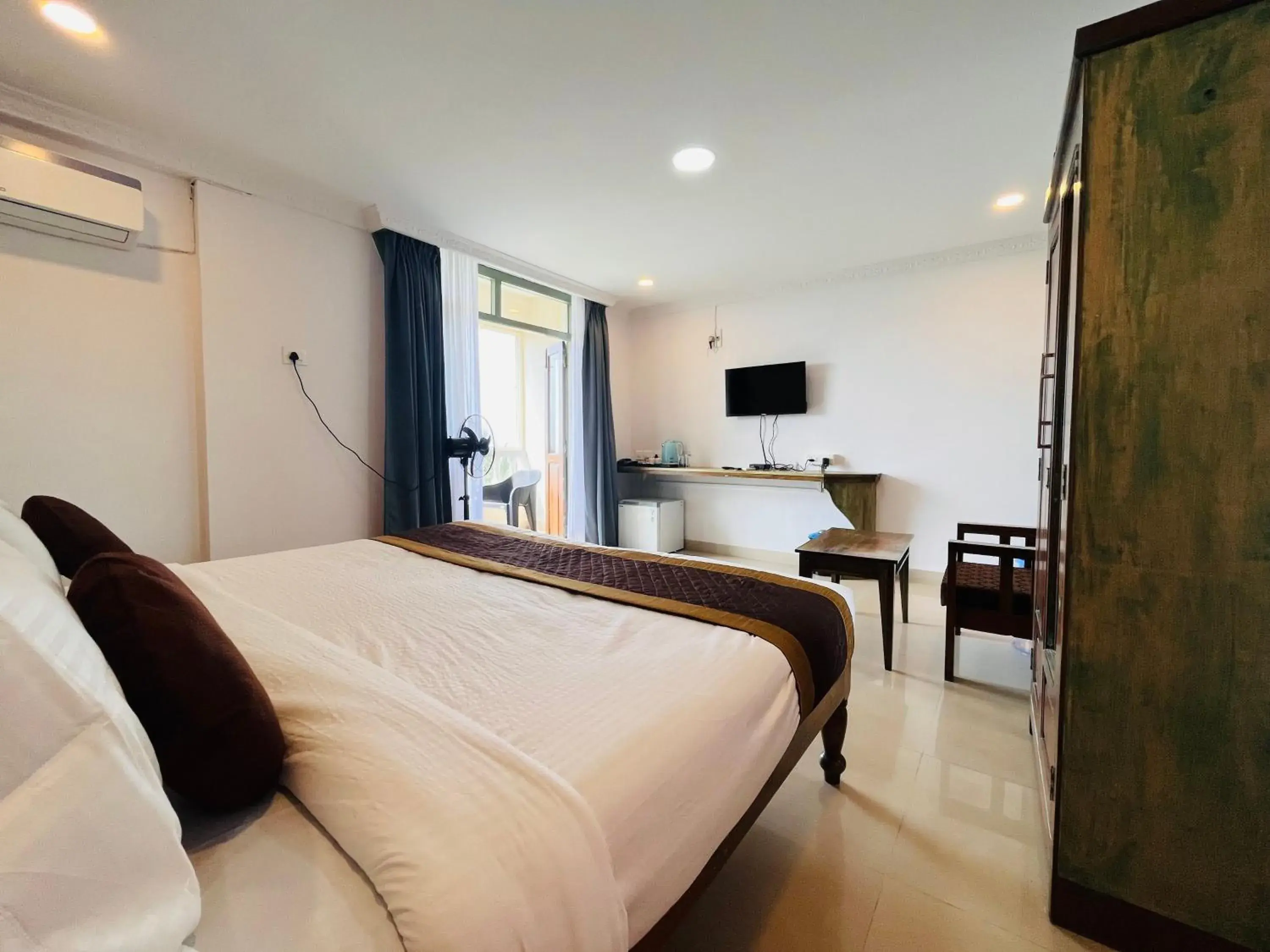 Photo of the whole room, Bed in Nagas Hotel Satyavati Morjim Photo of the whole room, Bed in Nagas Hotel Satyavati Morjim