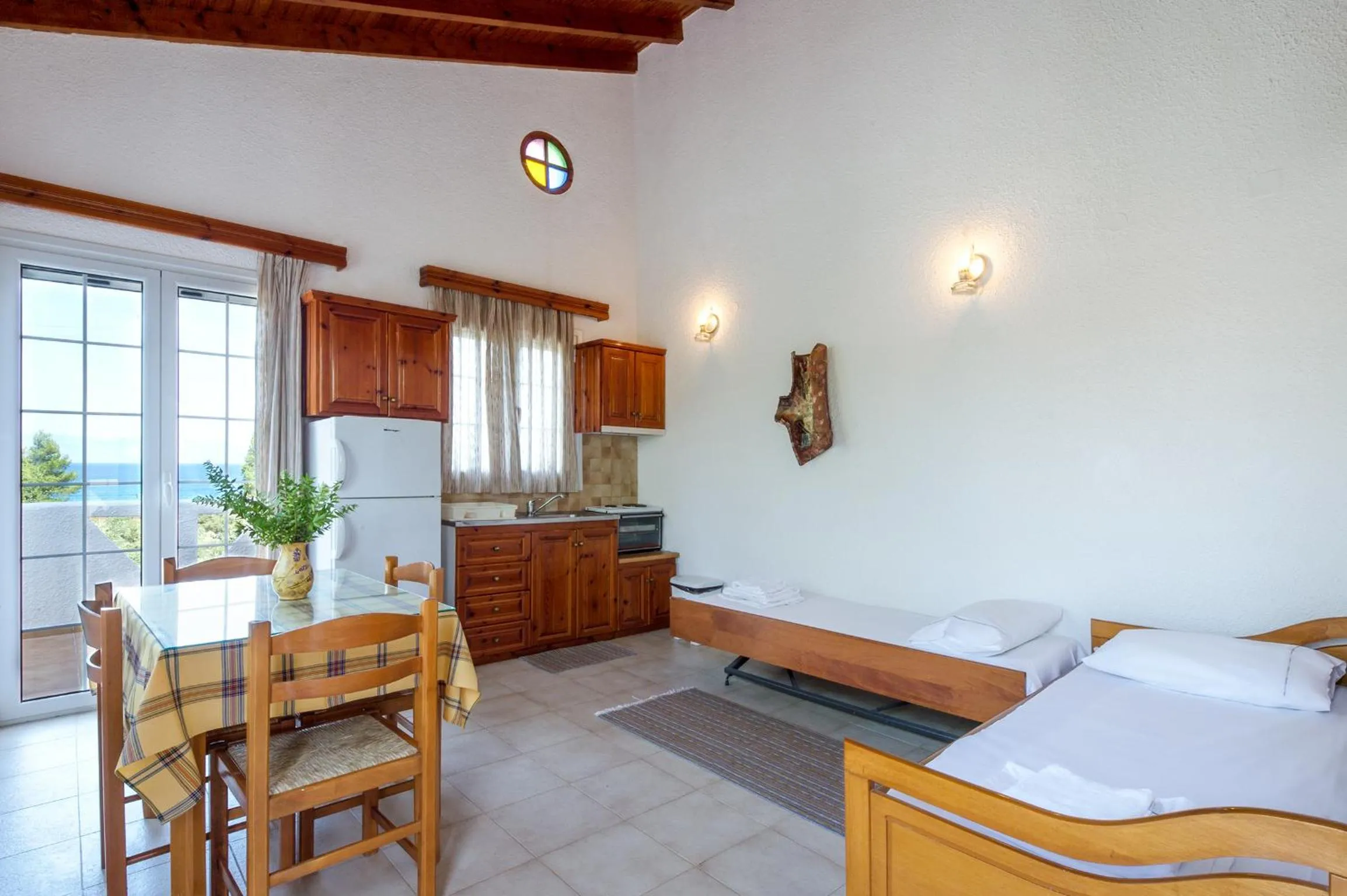 Seating area, Bed in Koroni Village