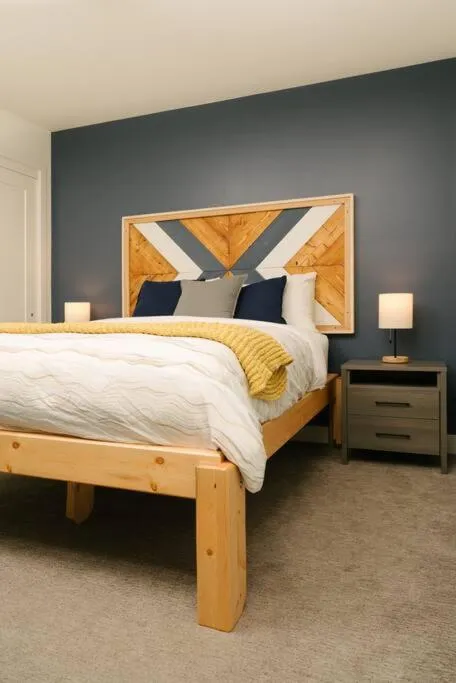 Bed in The Nest - Condo with Hot Tub & BBQ