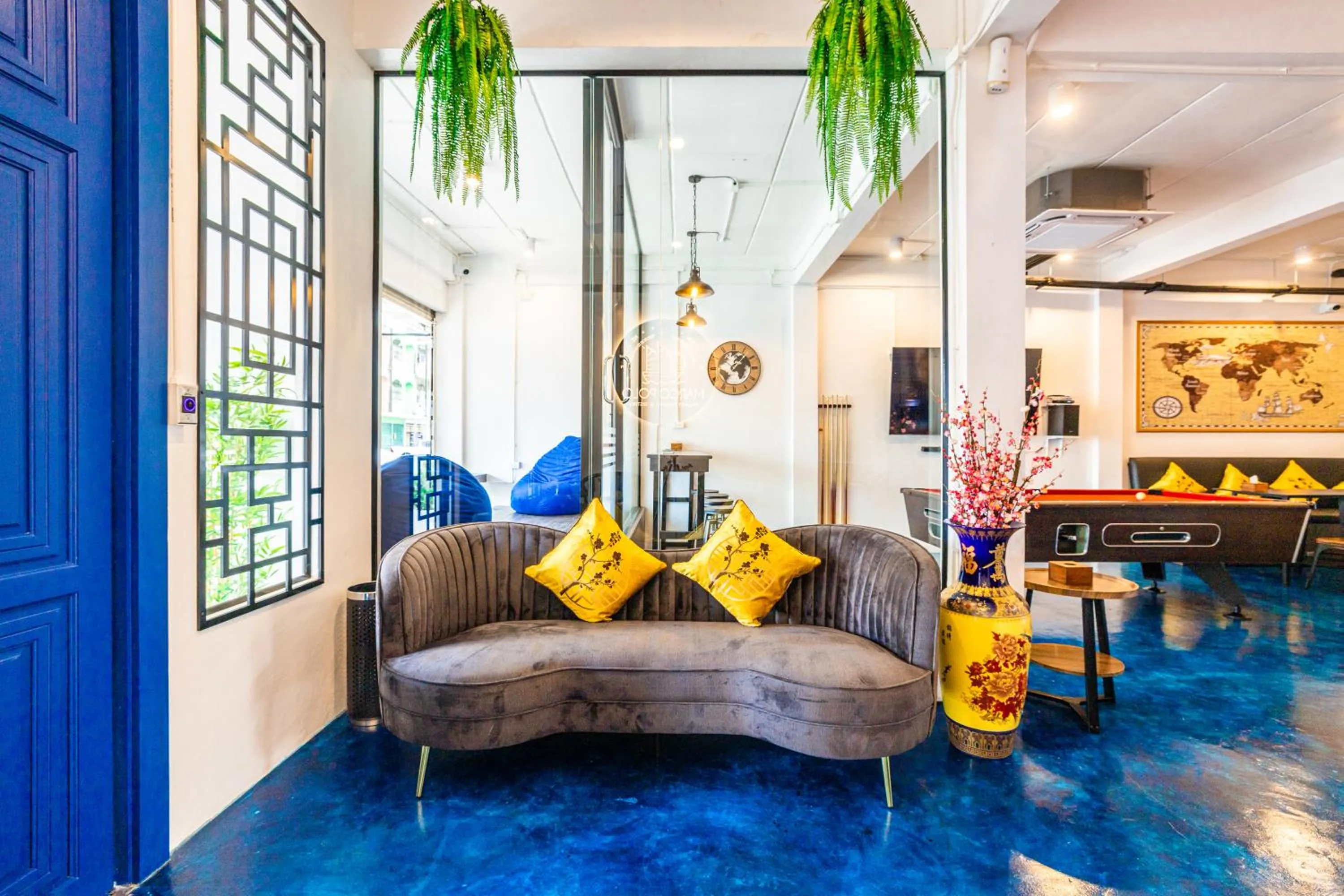 Living room in Marco Polo Phuket Poshtel & Bistro